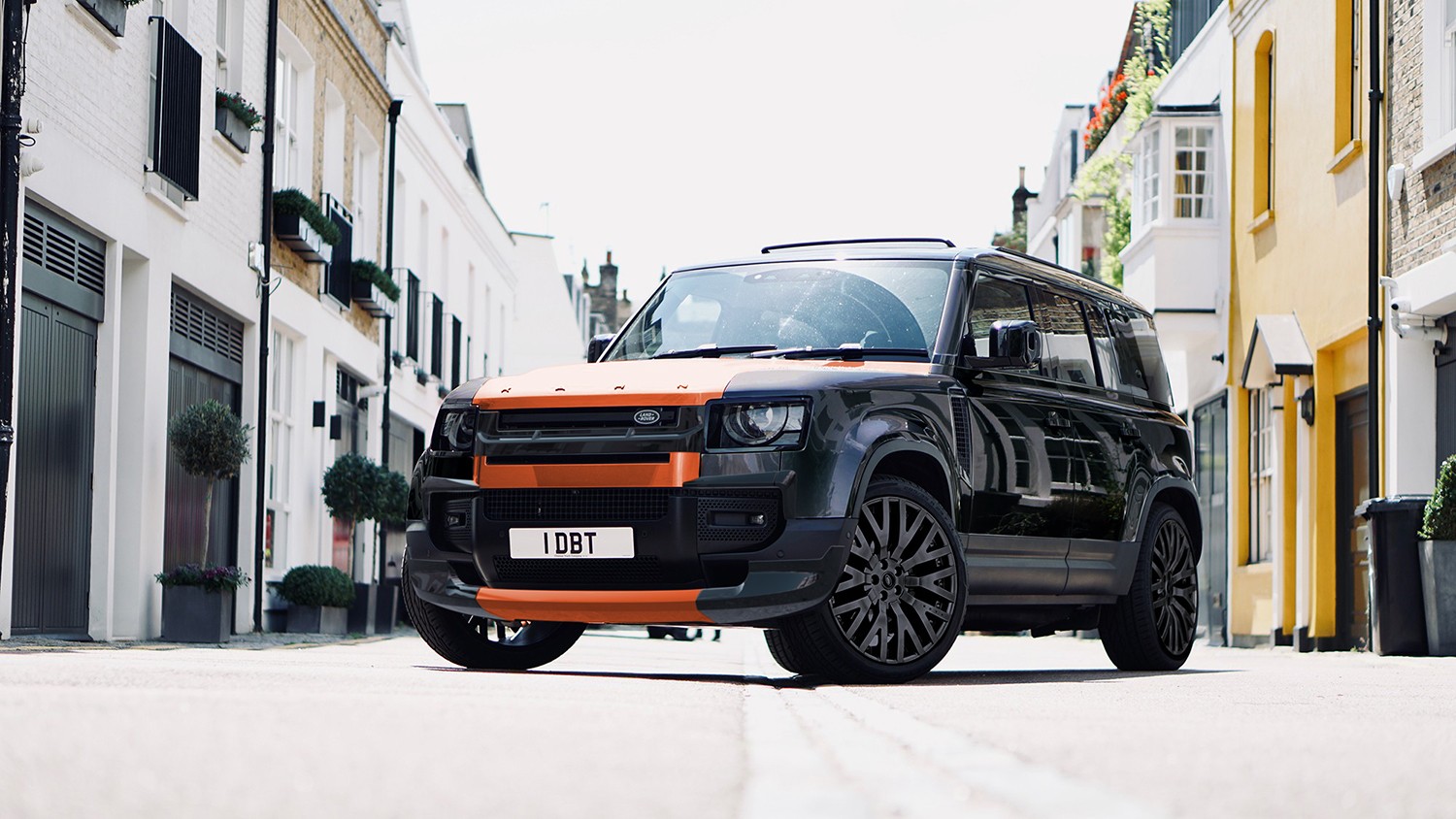 Would You Drive Around In A Black And Orange Land Rover Defender Like This?