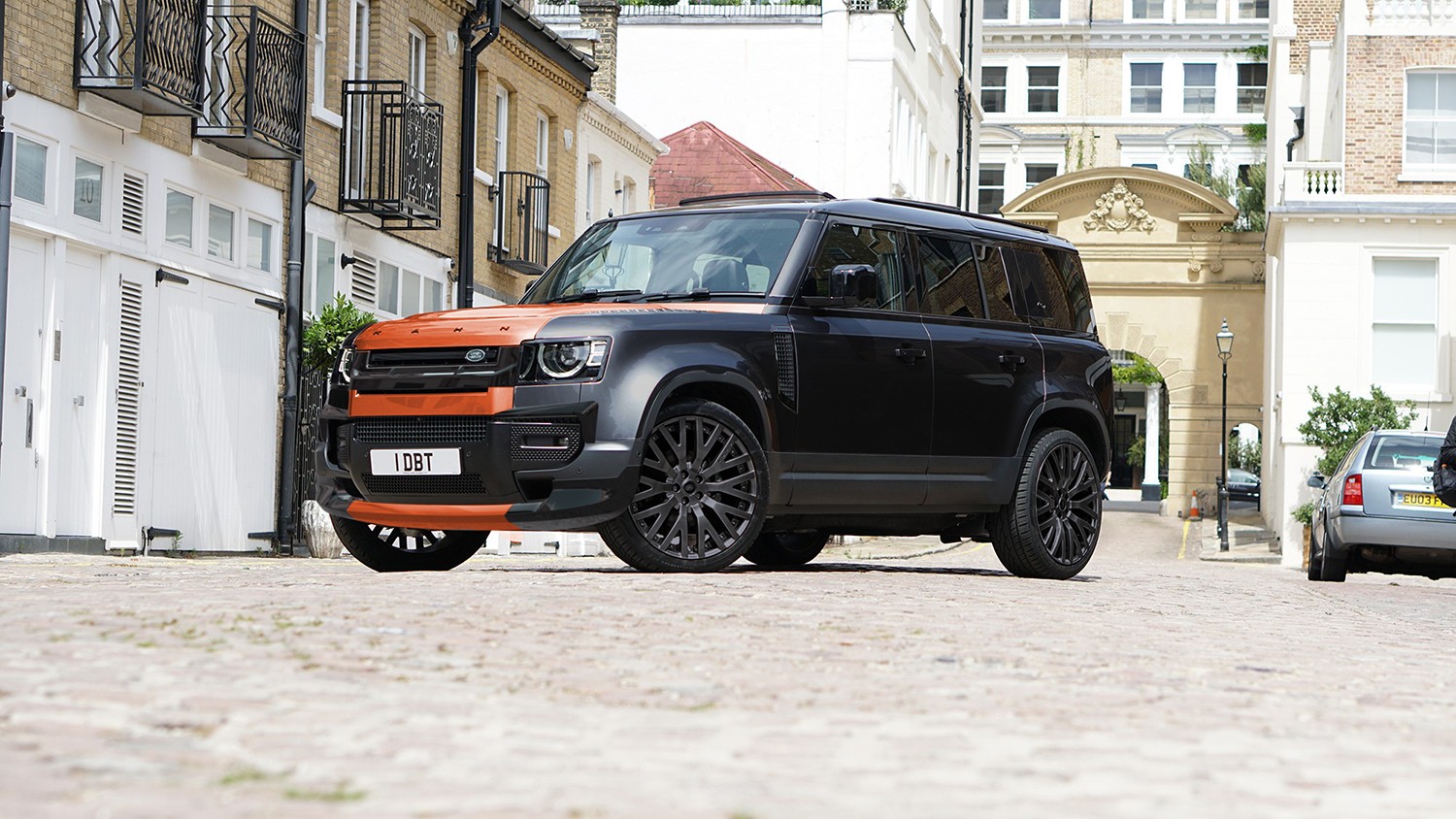 Would You Drive Around In A Black And Orange Land Rover Defender Like This?