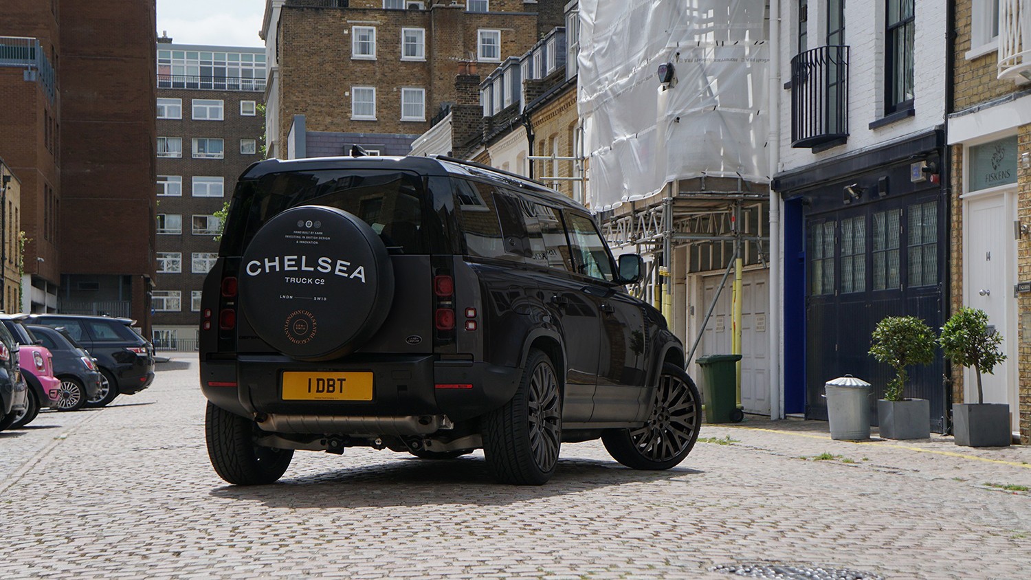 Would You Drive Around In A Black And Orange Land Rover Defender Like This?