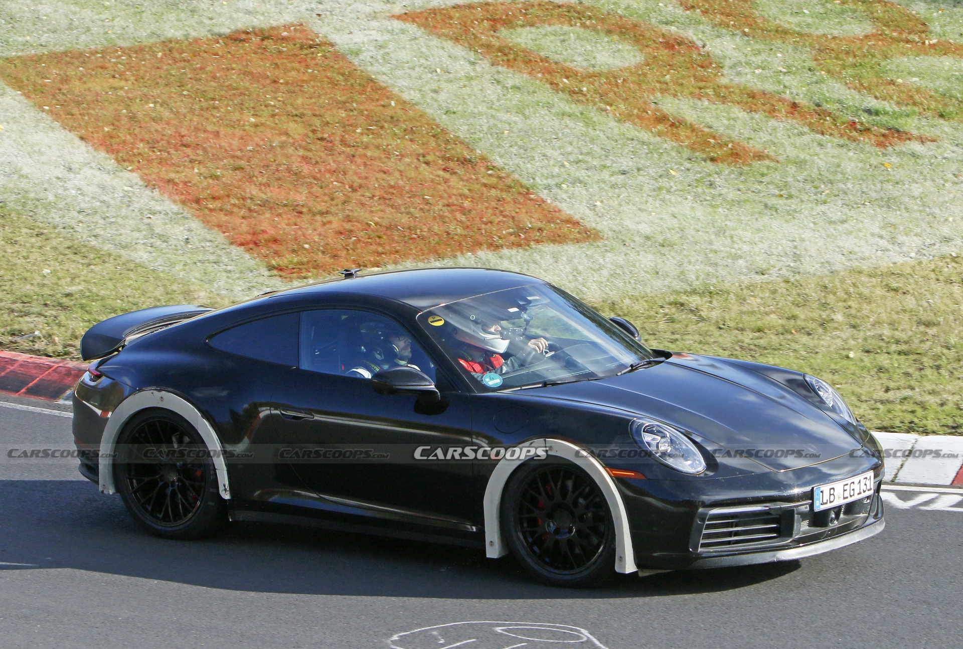 Porsche Spied Testing Weird High-Riding 911 On The Nurburgring