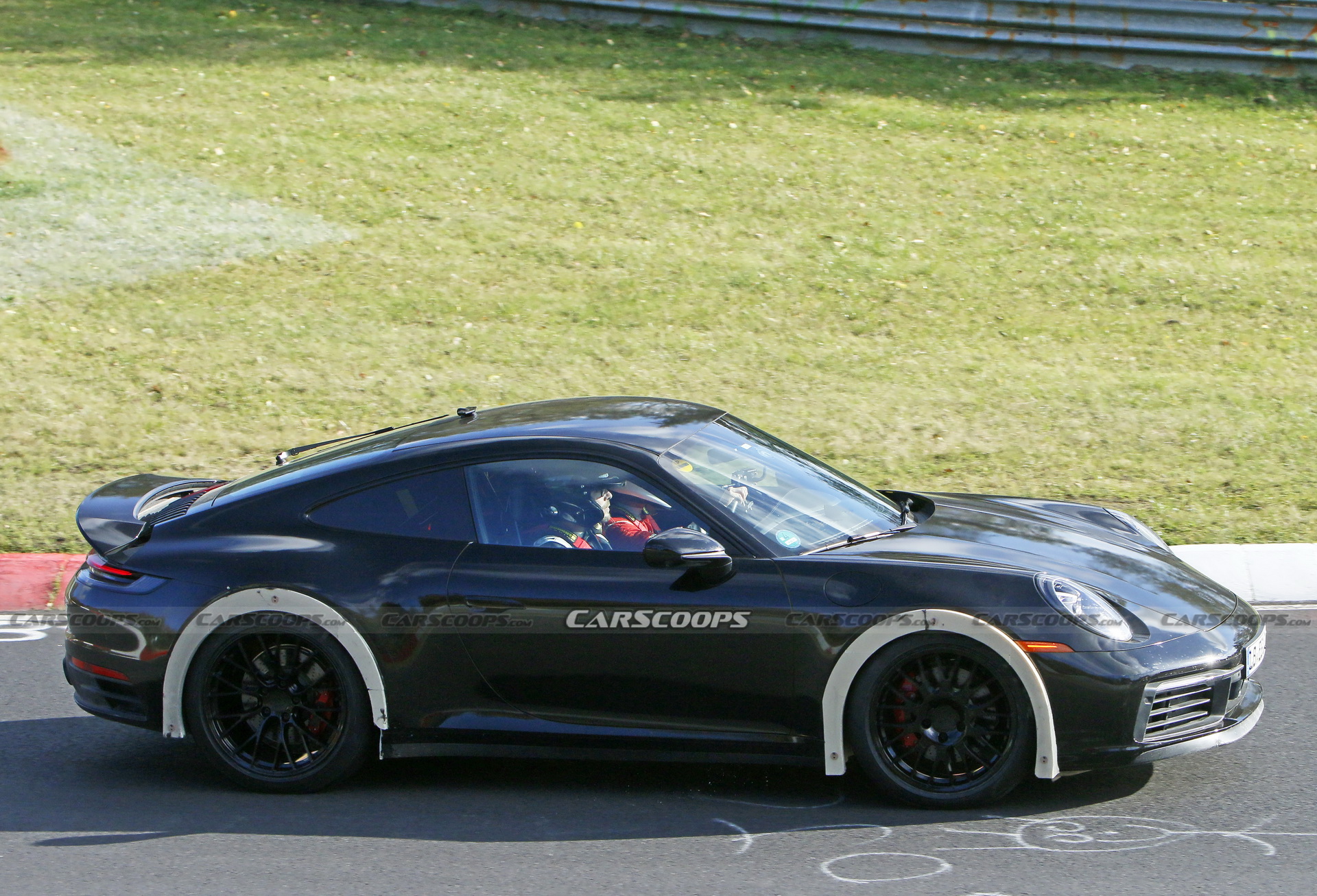 Porsche Spied Testing Weird High-Riding 911 On The Nurburgring