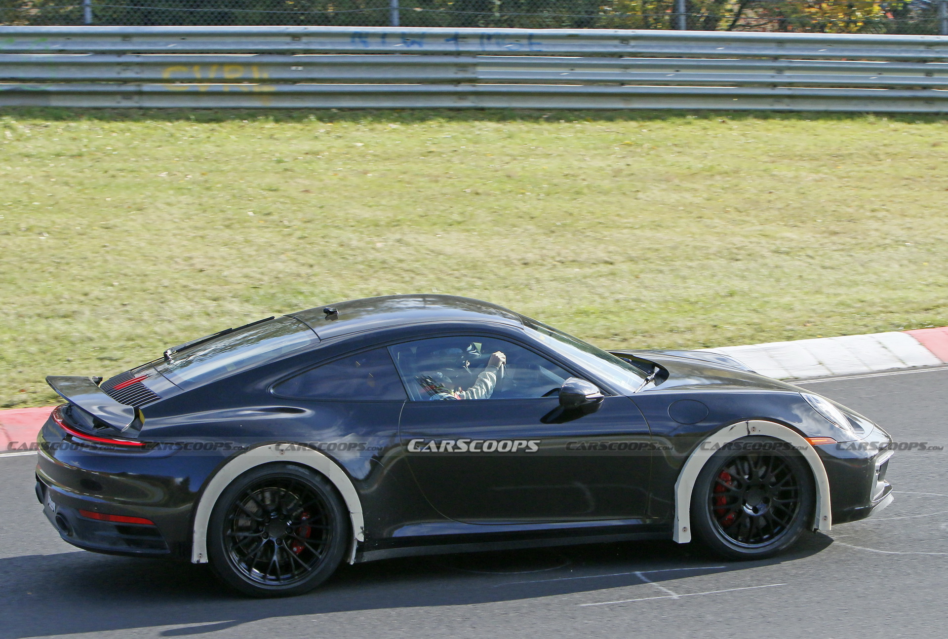 Porsche Spied Testing Weird High-Riding 911 On The Nurburgring