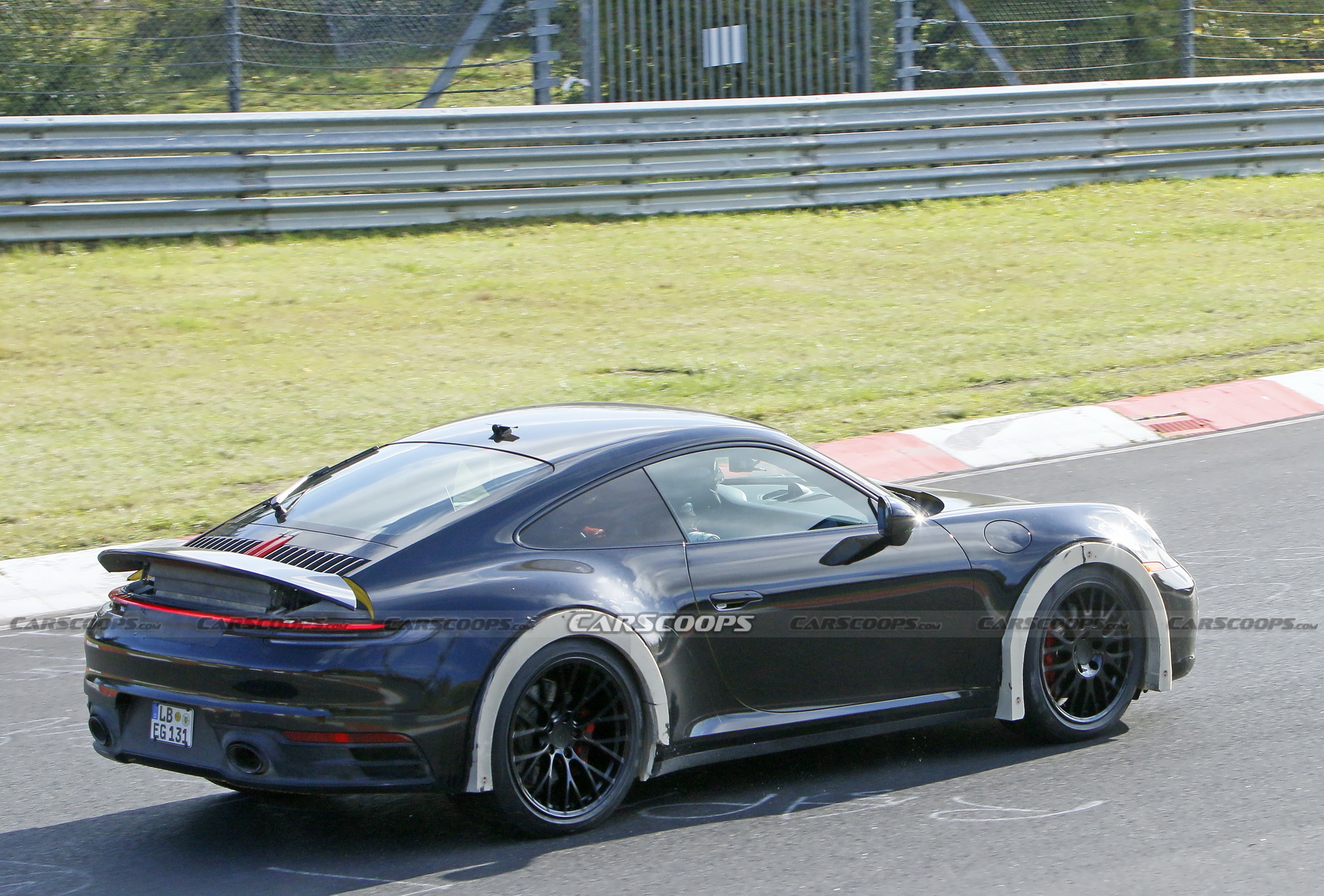 Porsche Spied Testing Weird High-Riding 911 On The Nurburgring