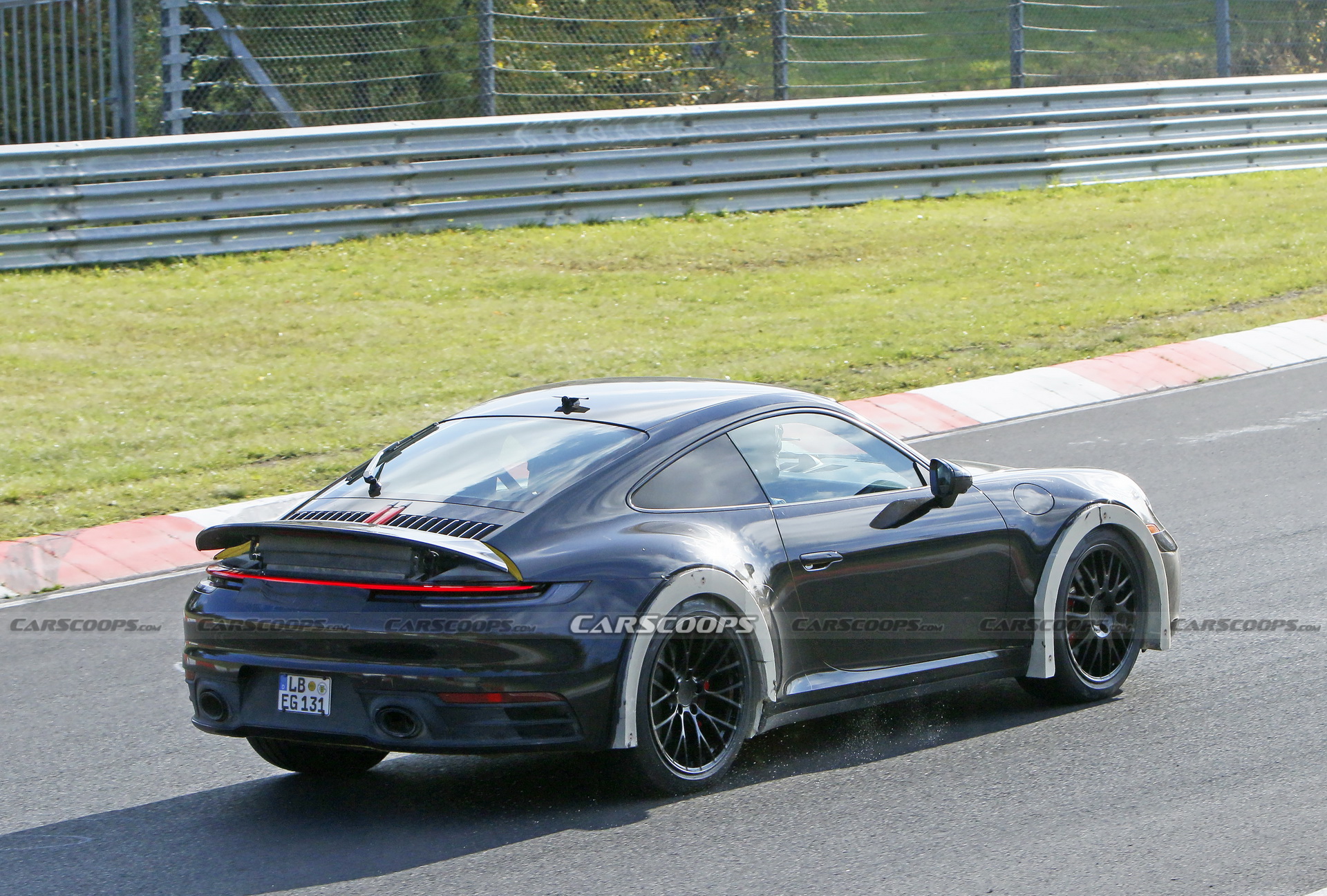Porsche Spied Testing Weird High-Riding 911 On The Nurburgring