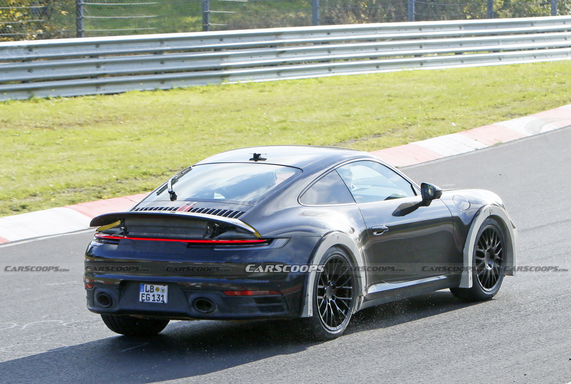 Porsche Spied Testing Weird High-Riding 911 On The Nurburgring