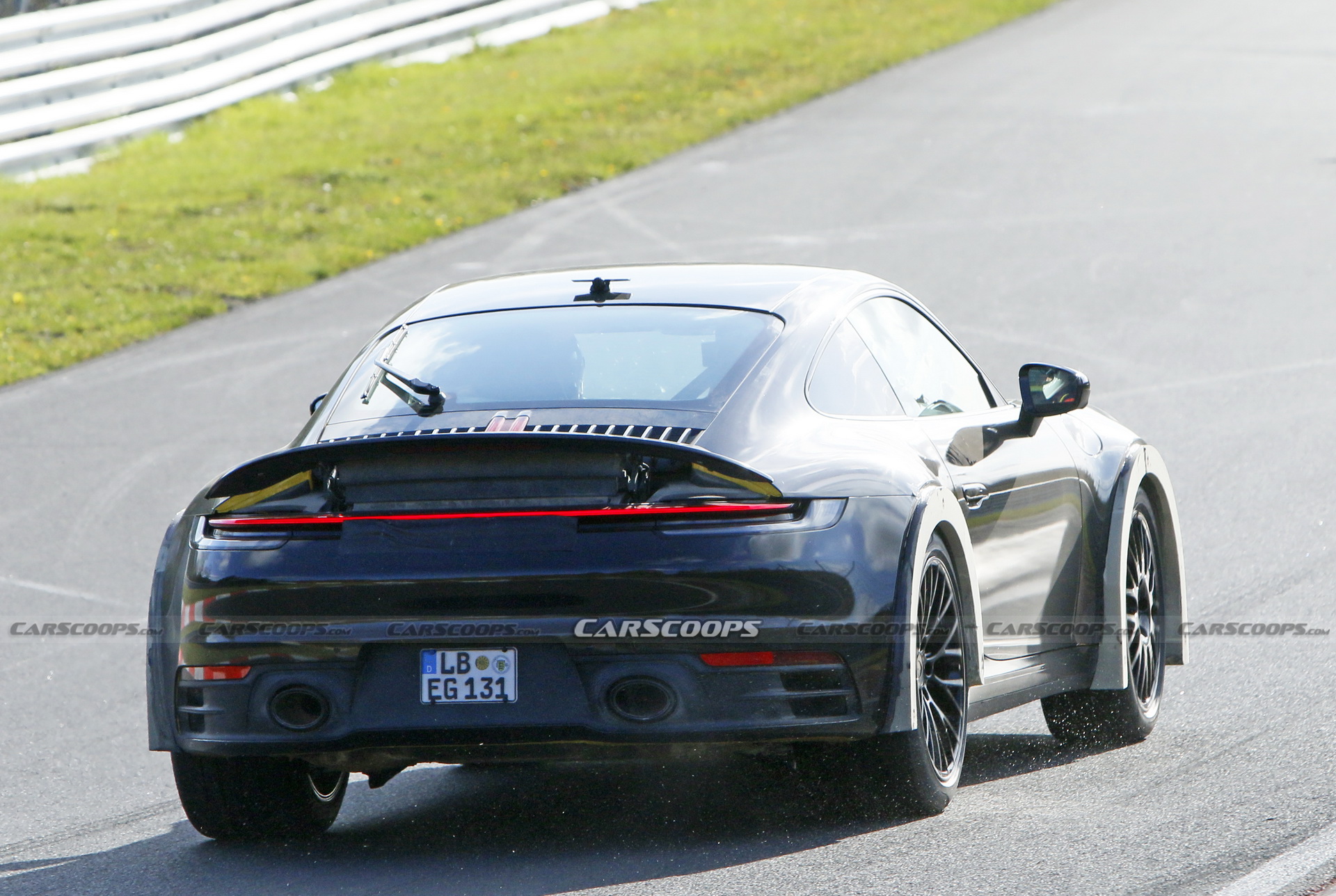 Porsche Spied Testing Weird High-Riding 911 On The Nurburgring