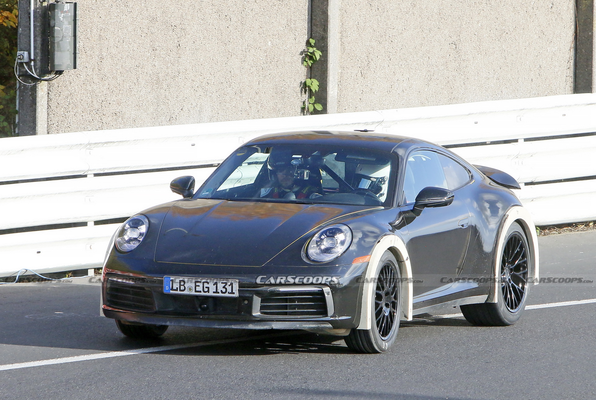 Porsche Spied Testing Weird High-Riding 911 On The Nurburgring