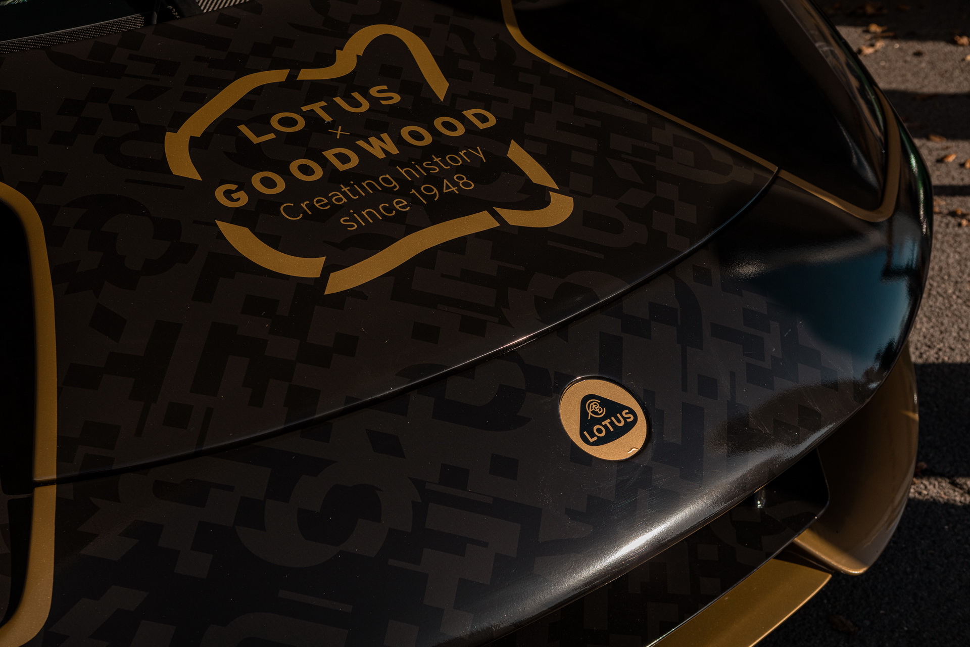Lotus Evija EV Dresses Up In Famous ‘John Player Special’ Black And Gold Livery