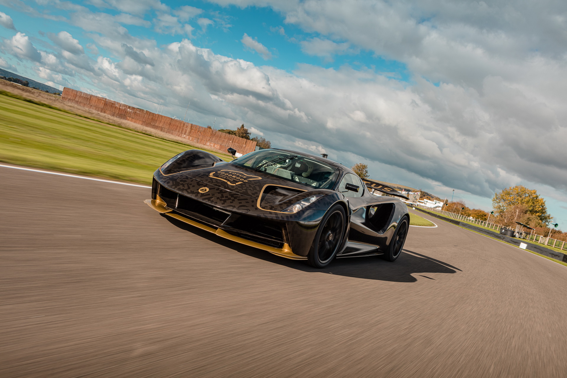 Lotus Evija EV Dresses Up In Famous ‘John Player Special’ Black And Gold Livery