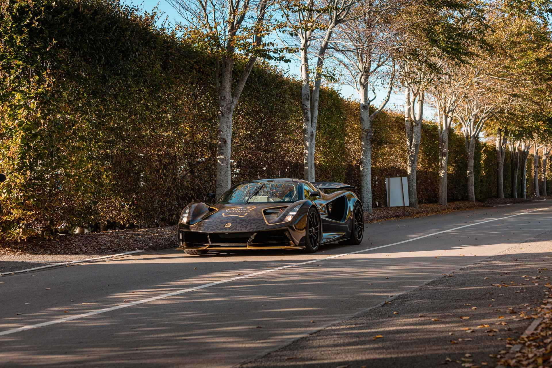 Lotus Evija EV Dresses Up In Famous ‘John Player Special’ Black And Gold Livery