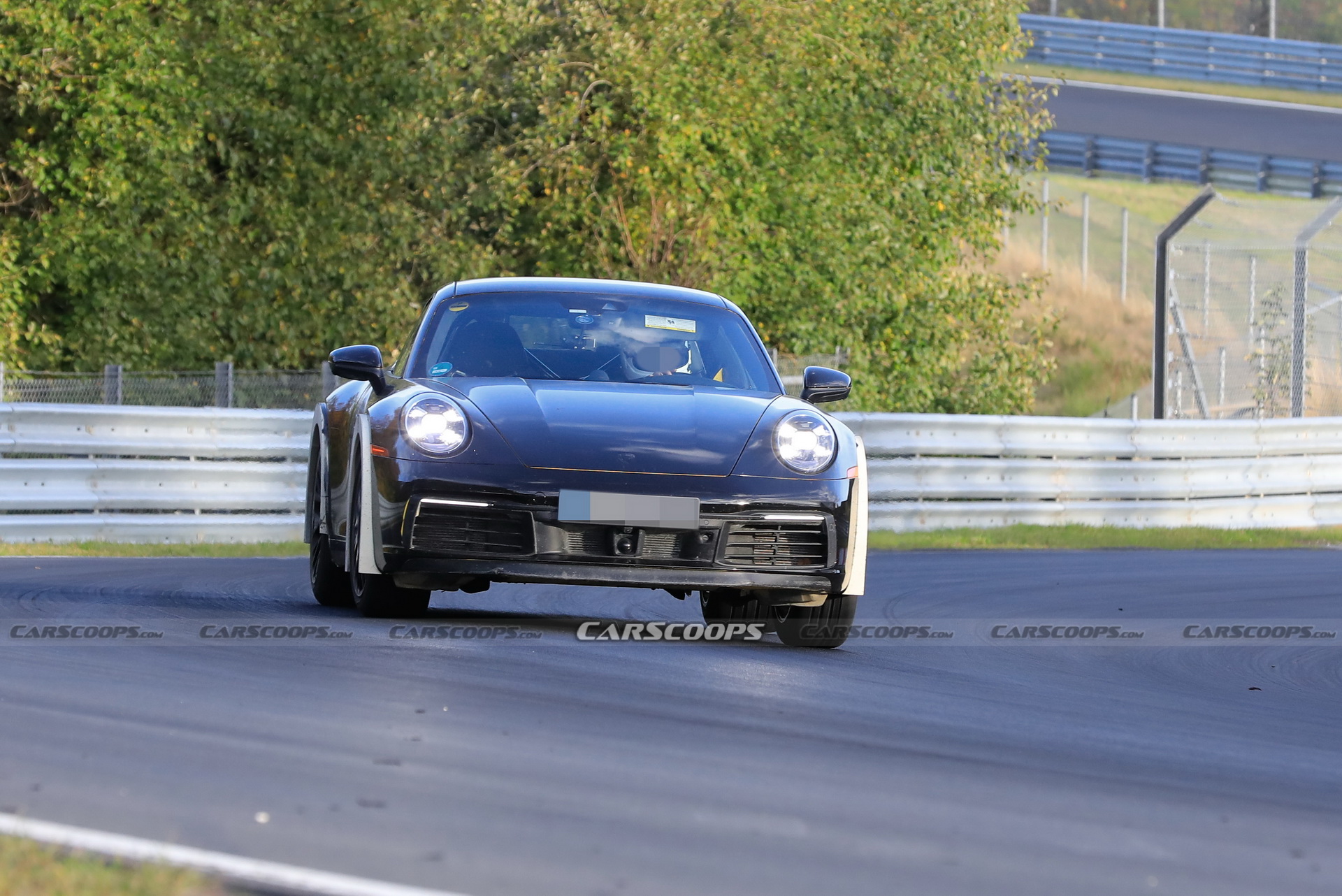 Porsche Spied Testing Weird High-Riding 911 On The Nurburgring
