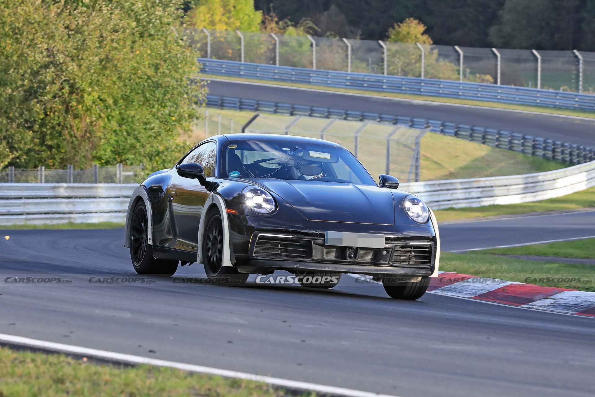 Porsche Spied Testing Weird High-Riding 911 On The Nurburgring