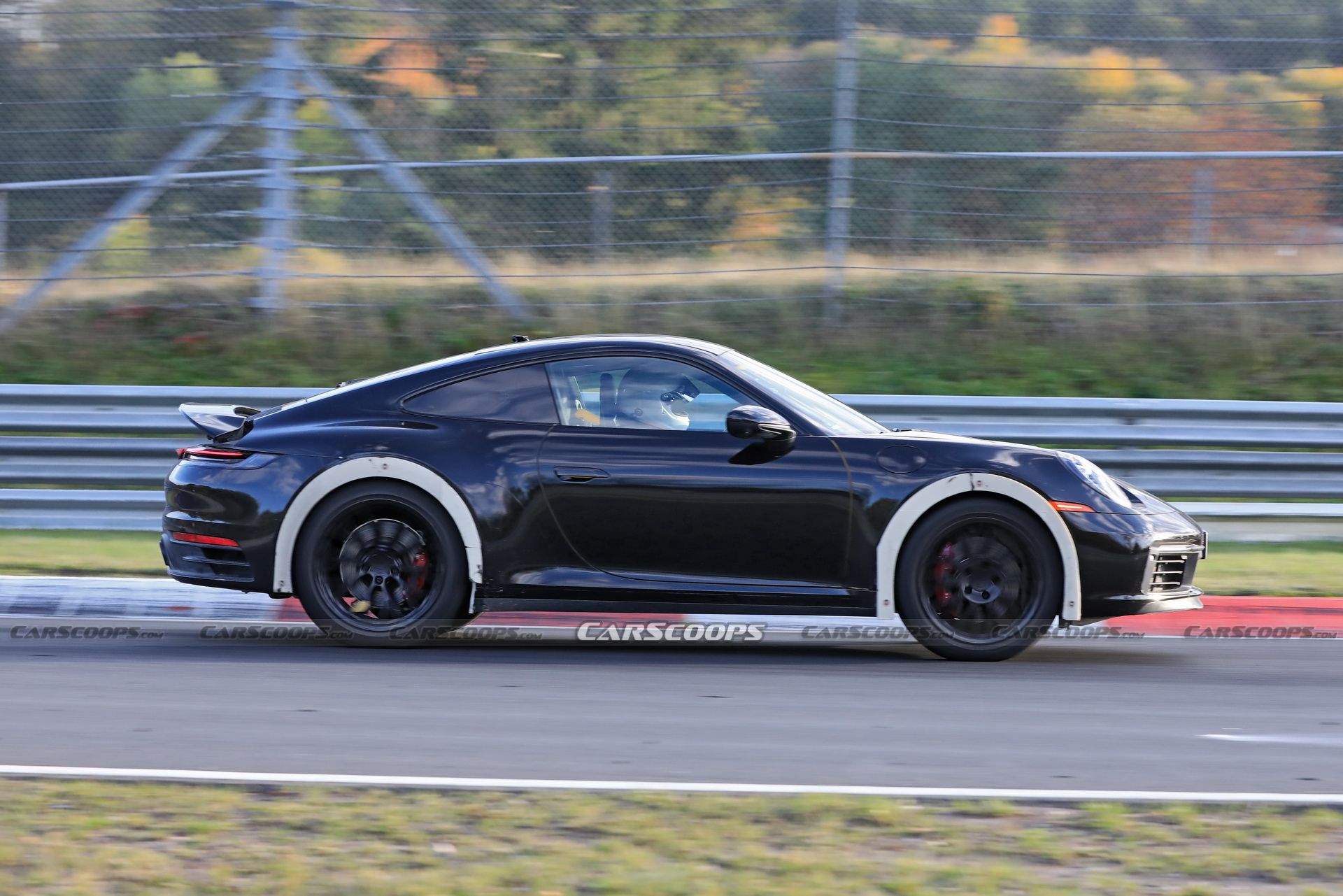 Porsche Spied Testing Weird High-Riding 911 On The Nurburgring