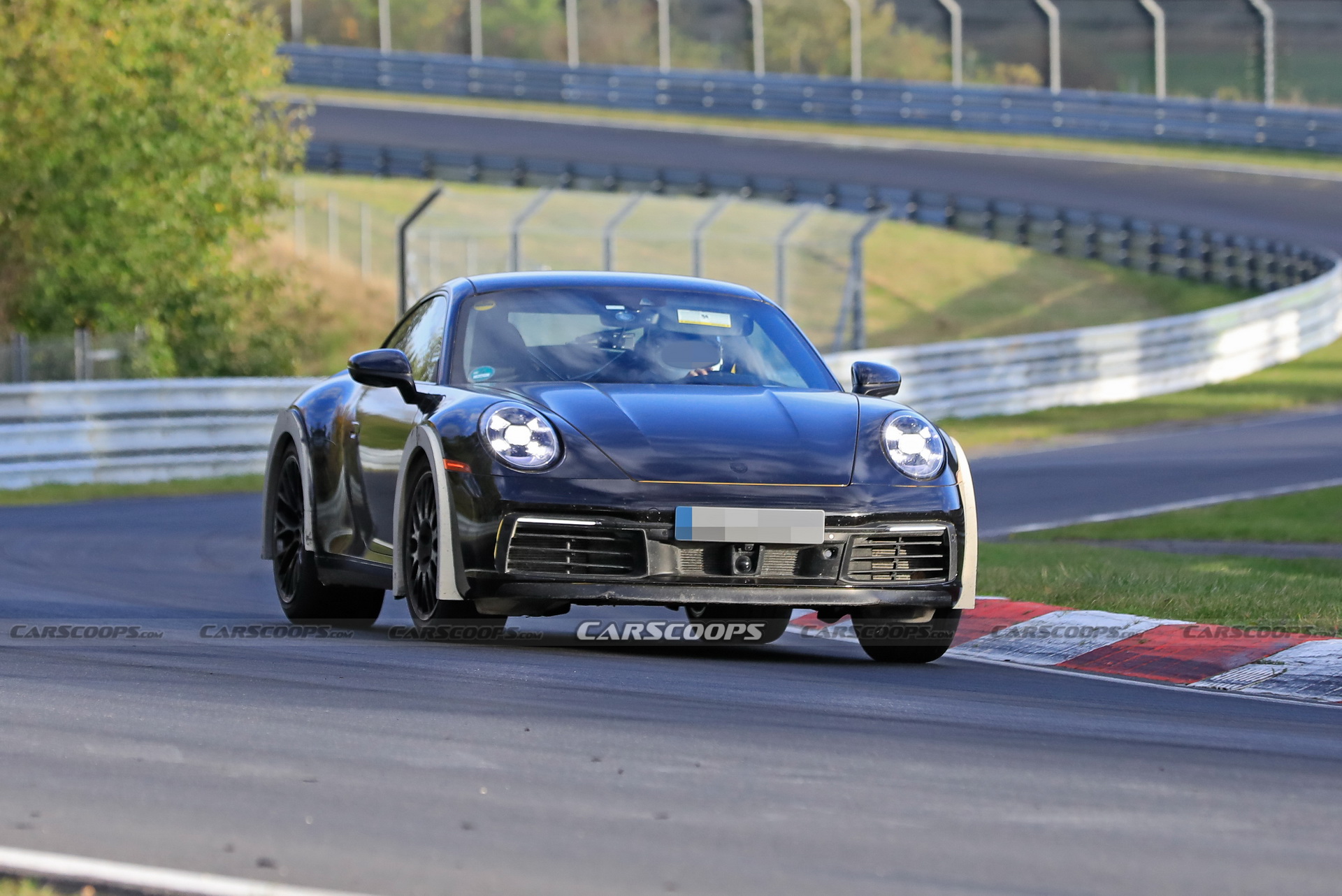 Porsche Spied Testing Weird High-Riding 911 On The Nurburgring