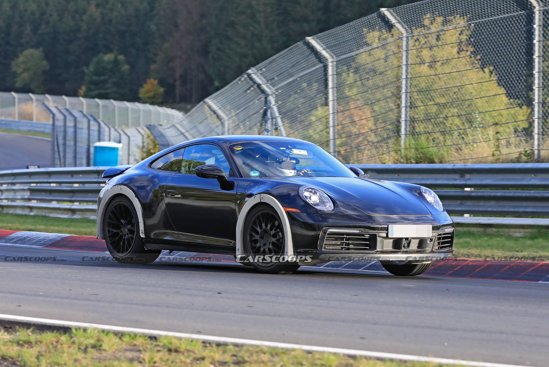 Porsche Spied Testing Weird High-Riding 911 On The Nurburgring