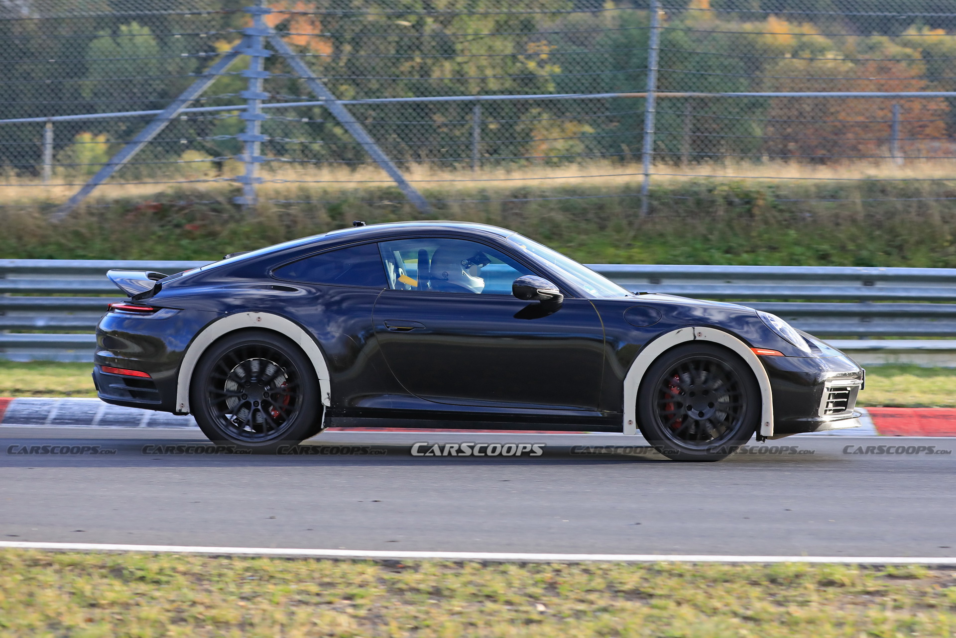 Porsche Spied Testing Weird High-Riding 911 On The Nurburgring