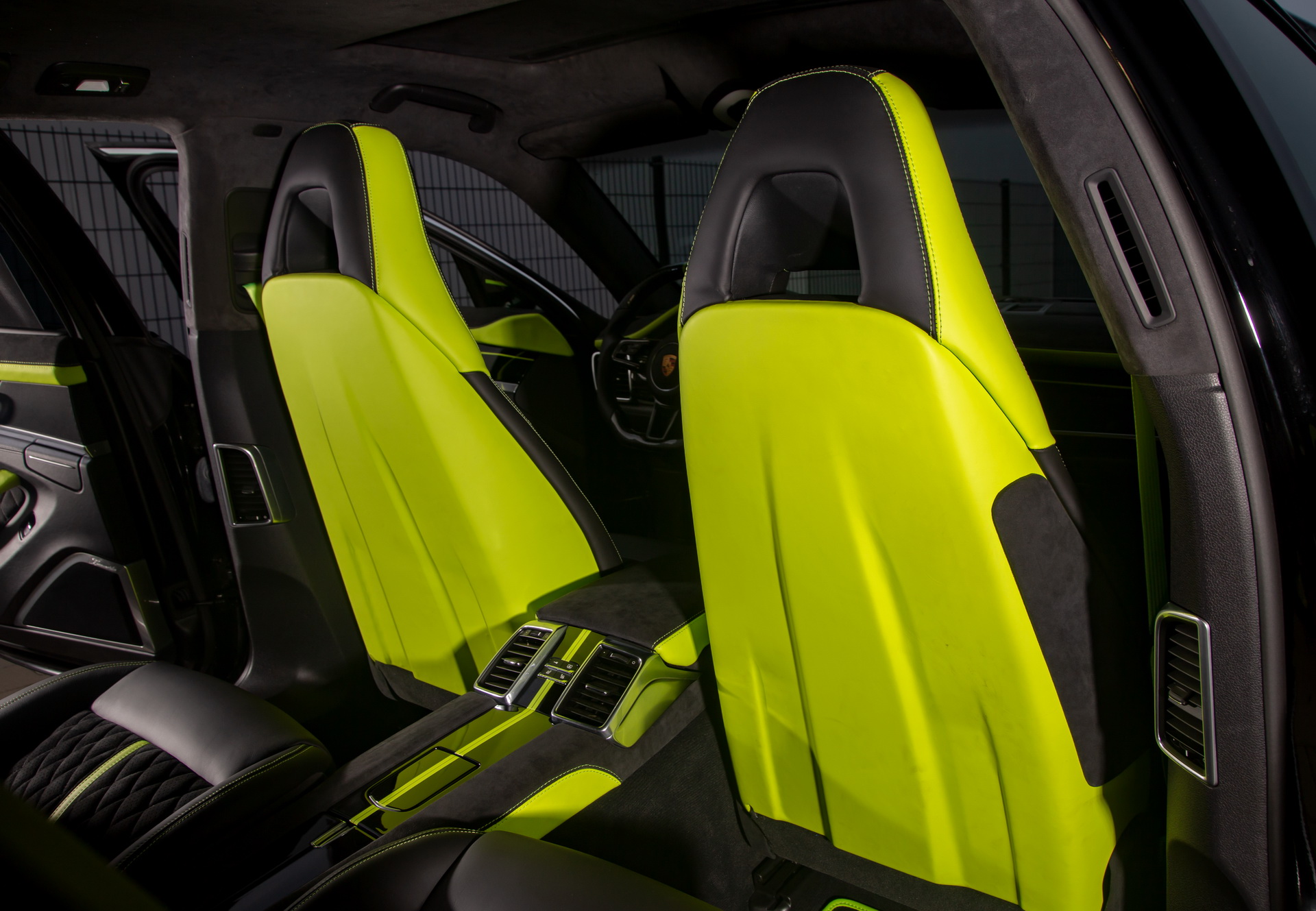 Behold A Porsche Panamera Interior With A Pagani-Like Steering Wheel And Lambo-Sourced Leather