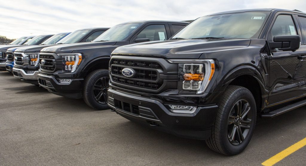  Ford Parking 2021 F-150s At Amusement Park While Non-Union Workers Fit Seatbelts