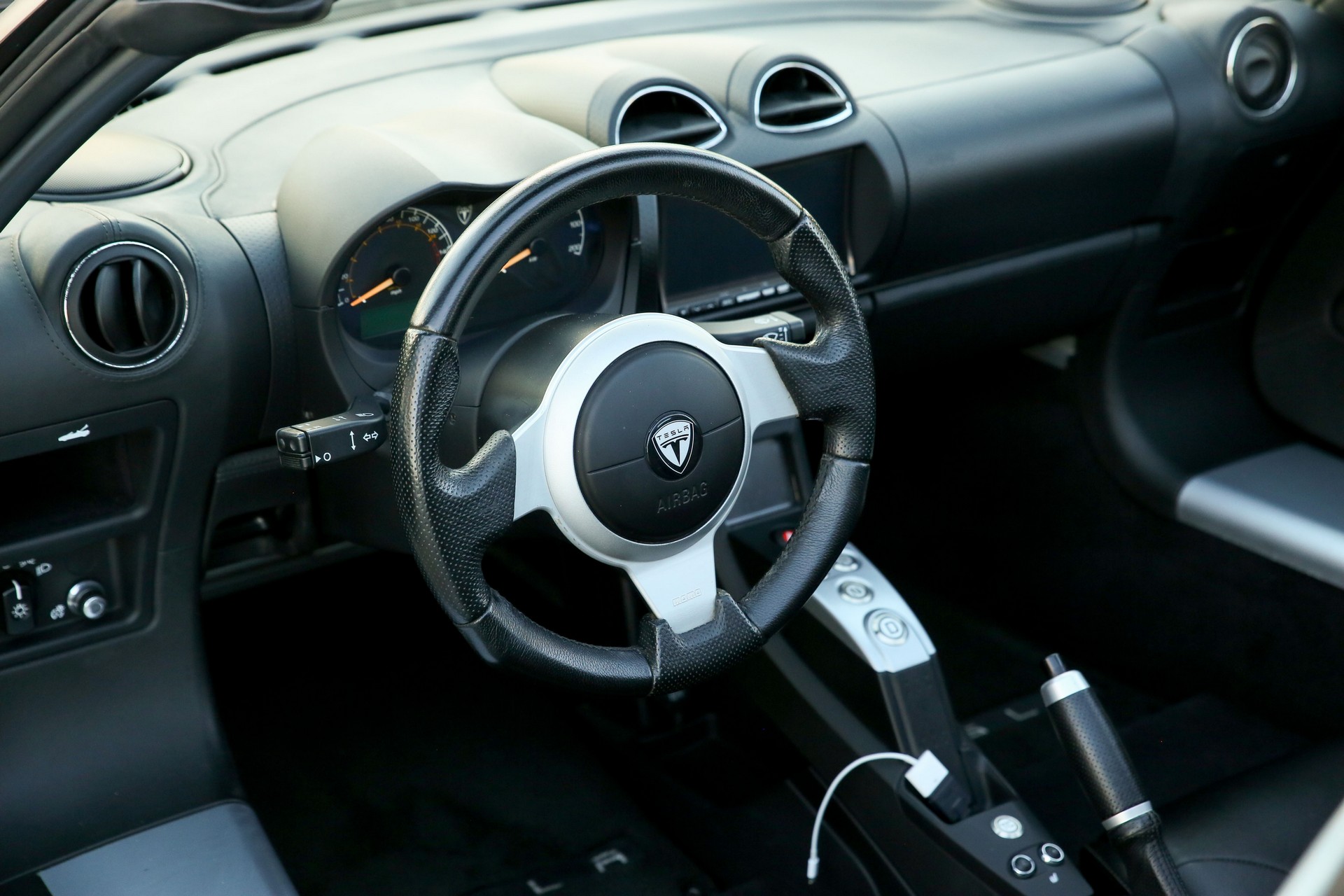 Tired Of Waiting For The New Tesla Roadster? Buy This 2011 Model Instead