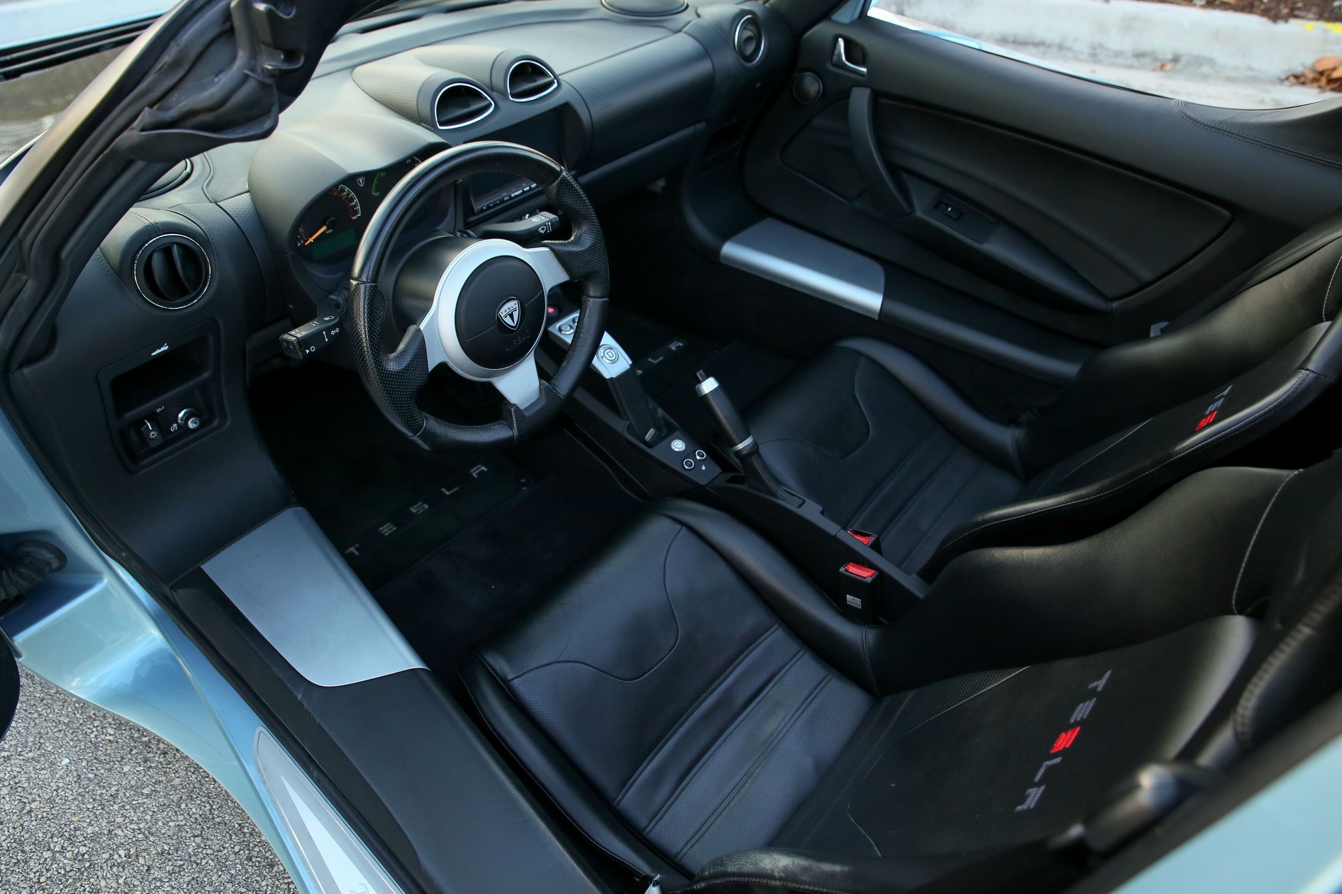 Tired Of Waiting For The New Tesla Roadster? Buy This 2011 Model Instead