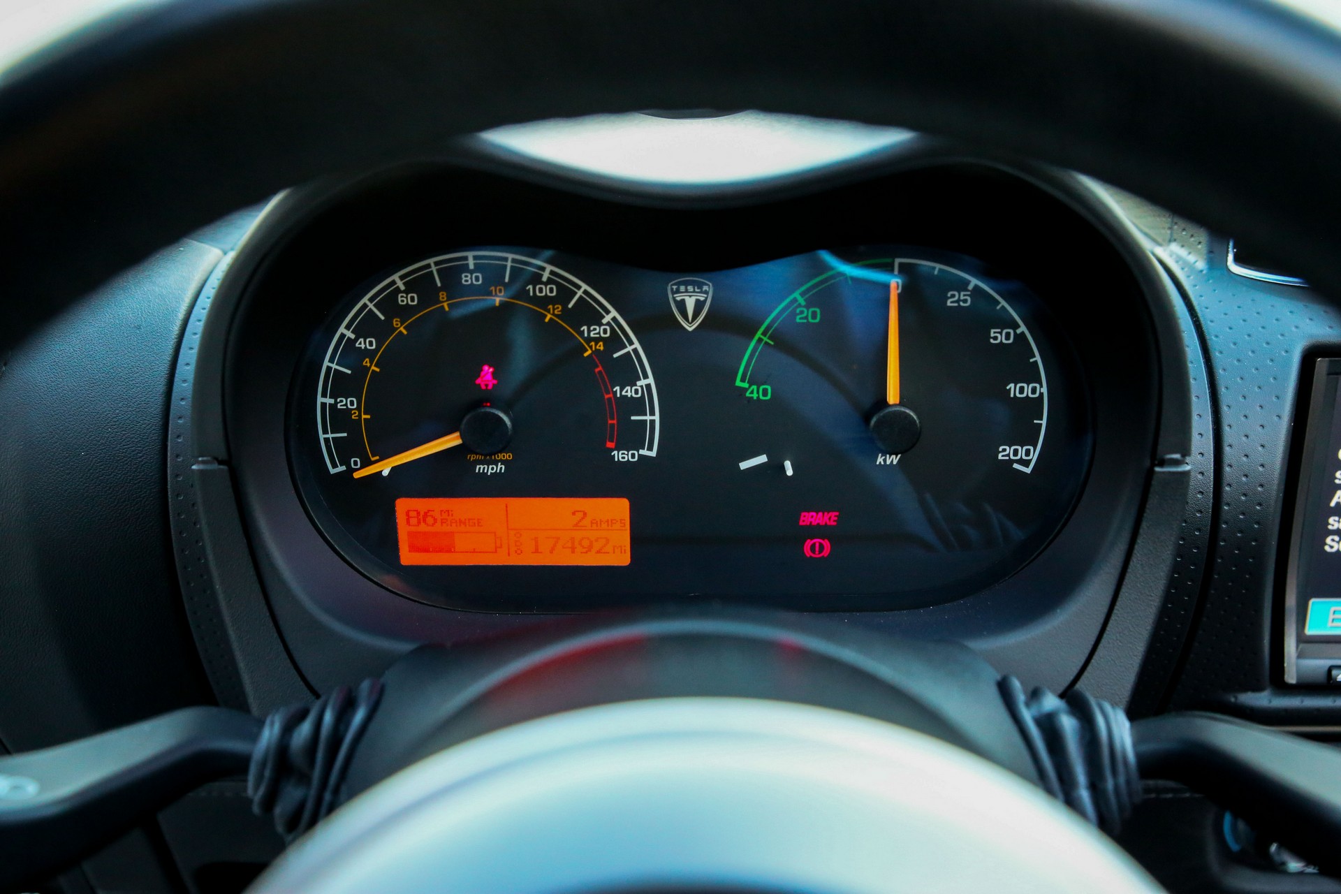 Tired Of Waiting For The New Tesla Roadster? Buy This 2011 Model Instead