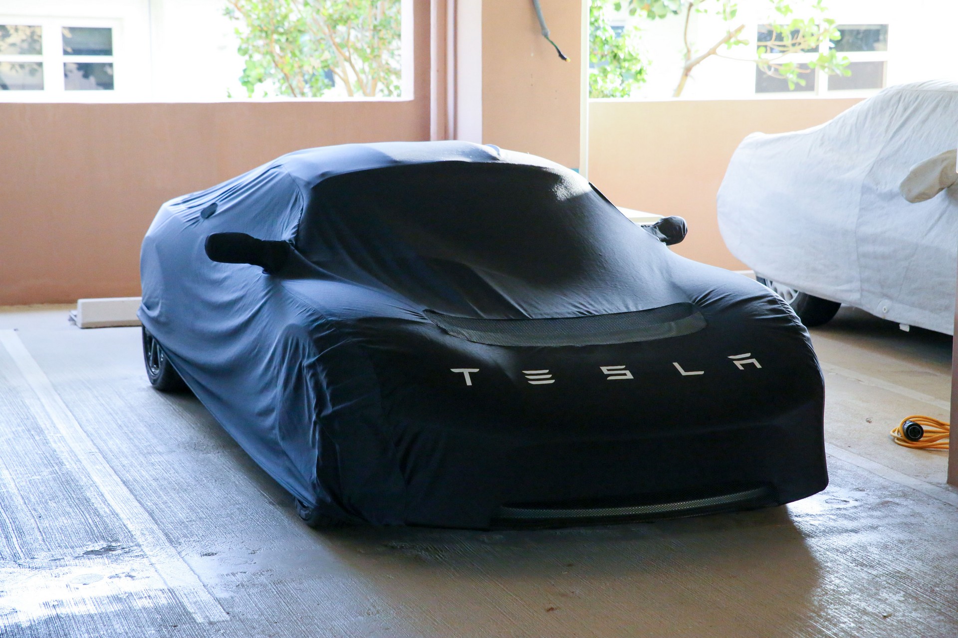 Tired Of Waiting For The New Tesla Roadster? Buy This 2011 Model Instead
