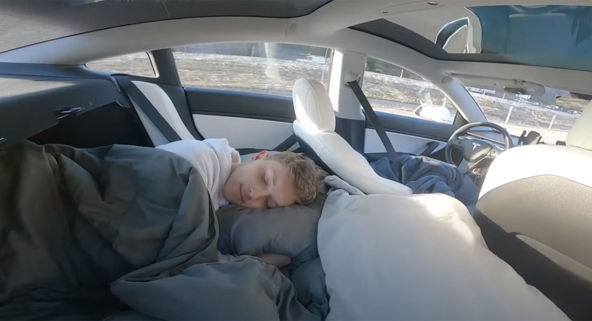 Young Driver Pretends To Sleep In His Tesla Model 3 With Autopilot Engaged  | Carscoops