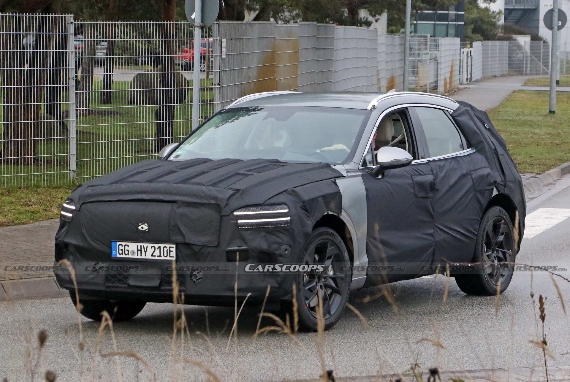 Electrified Genesis eGV70 SUV Makes Spy Debut Under Heavy Camouflage