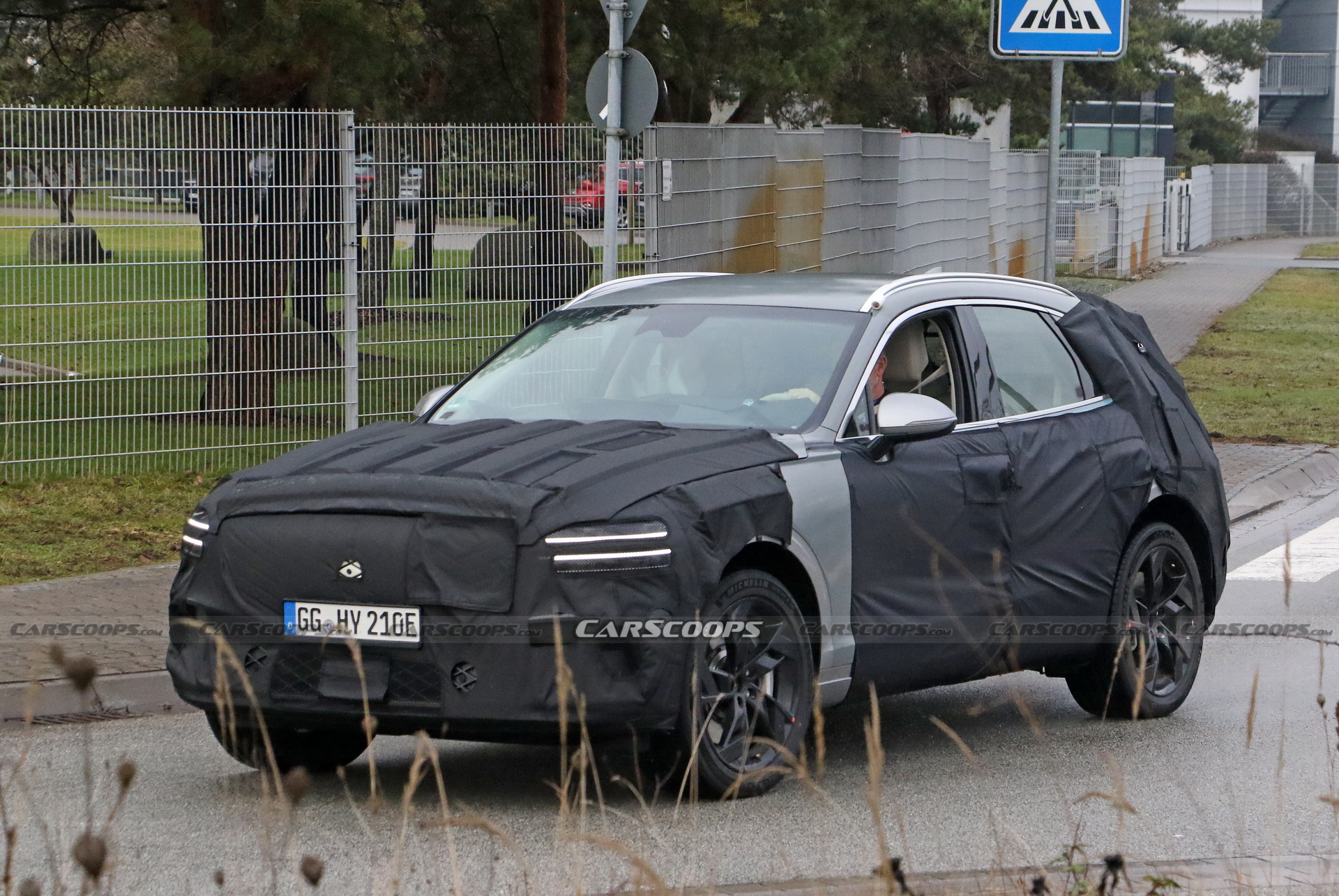 Electrified Genesis eGV70 SUV Makes Spy Debut Under Heavy Camouflage