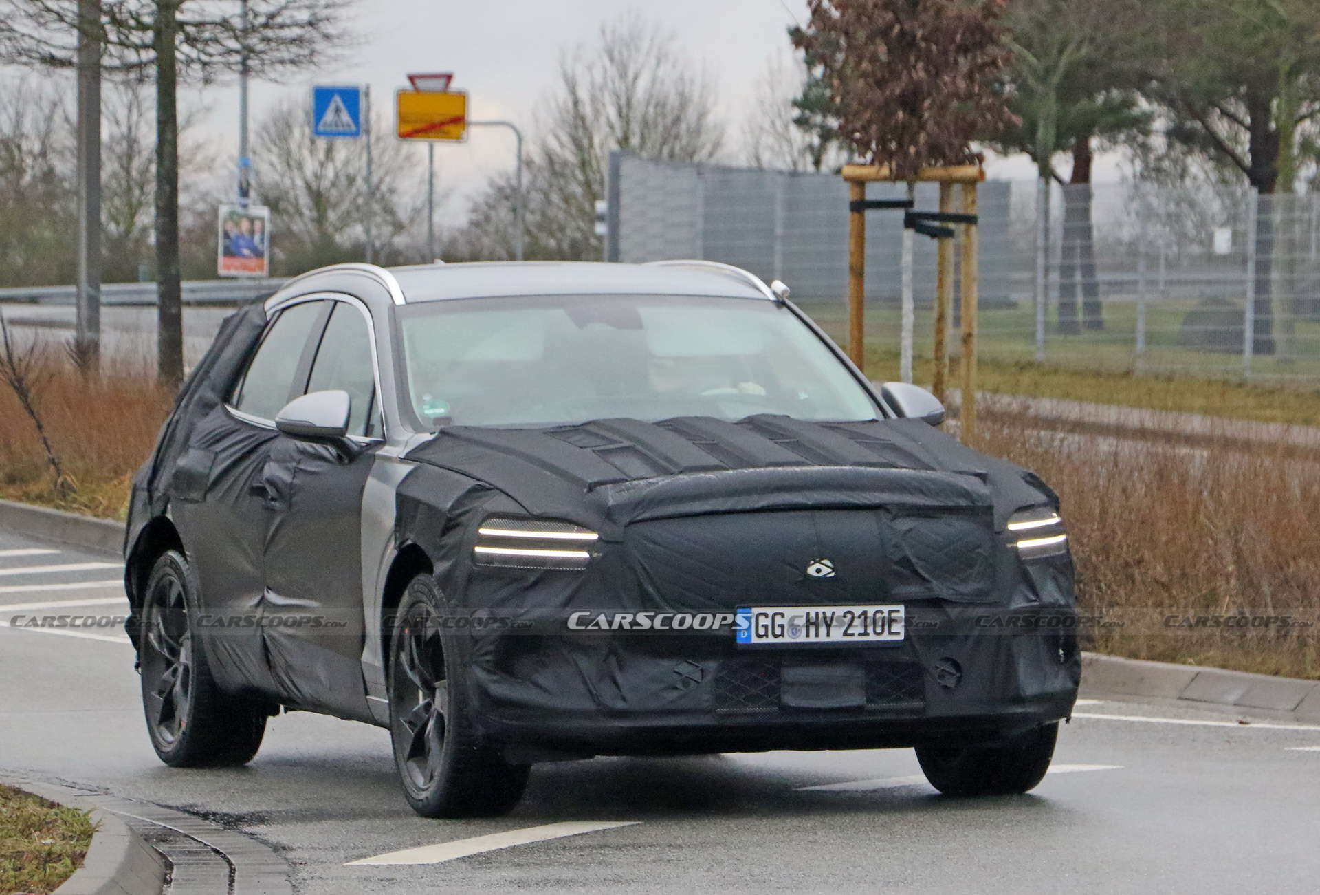Electrified Genesis eGV70 SUV Makes Spy Debut Under Heavy Camouflage
