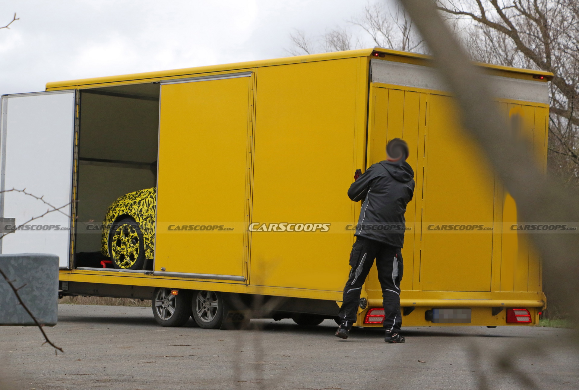 2022 Opel Astra Makes Spy Debut With A Not-So-Subtle Yellow Camo Wrap
