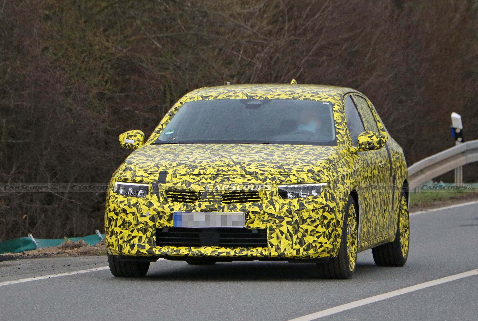 2022 Opel Astra Makes Spy Debut With A Not-So-Subtle Yellow Camo Wrap