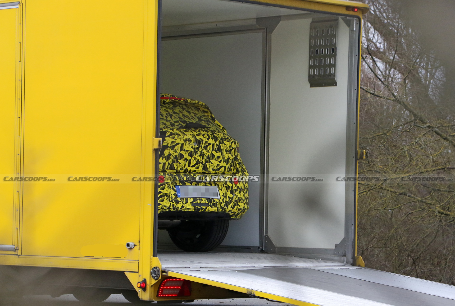 2022 Opel Astra Makes Spy Debut With A Not-So-Subtle Yellow Camo Wrap