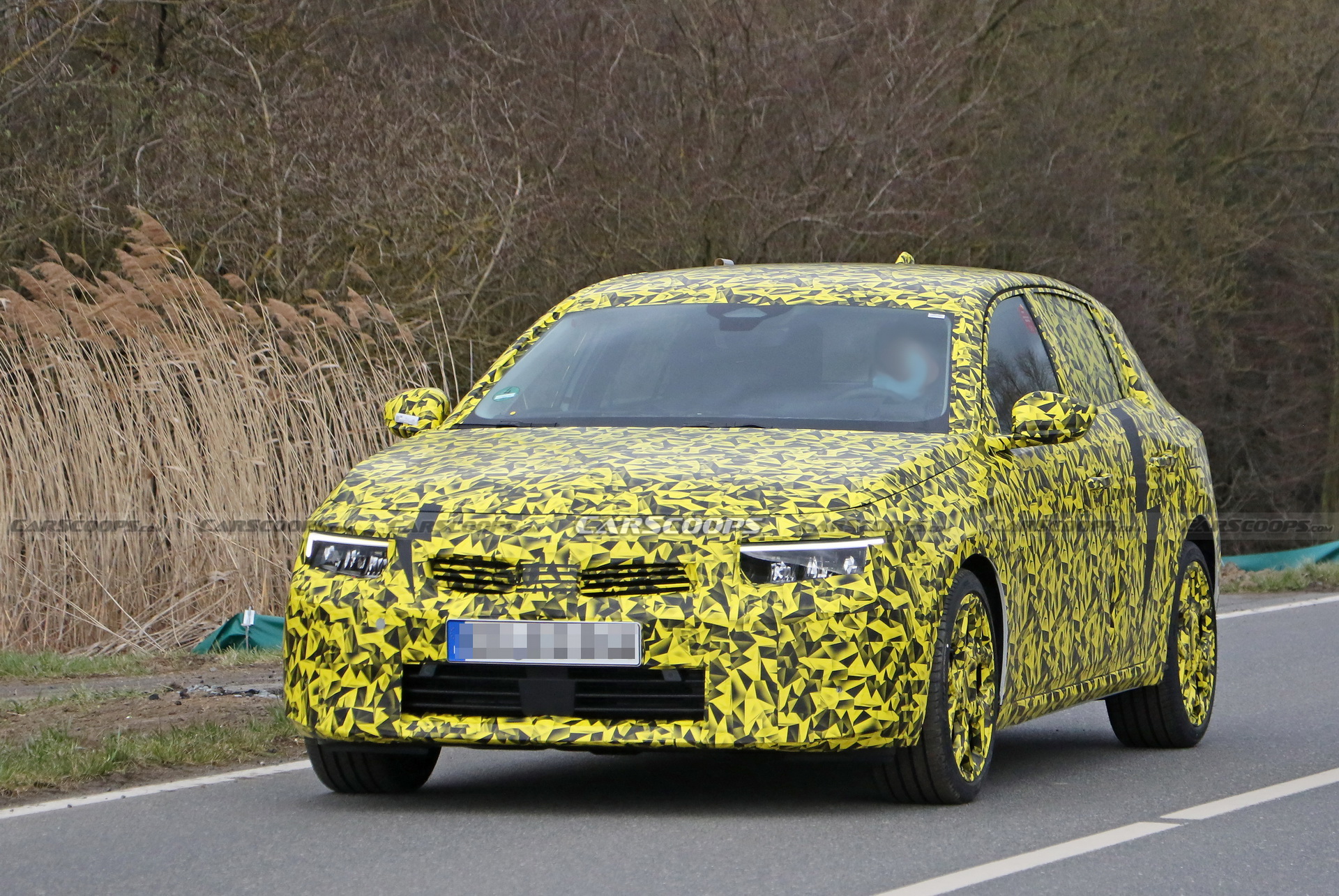 2022 Opel Astra Makes Spy Debut With A Not-So-Subtle Yellow Camo Wrap