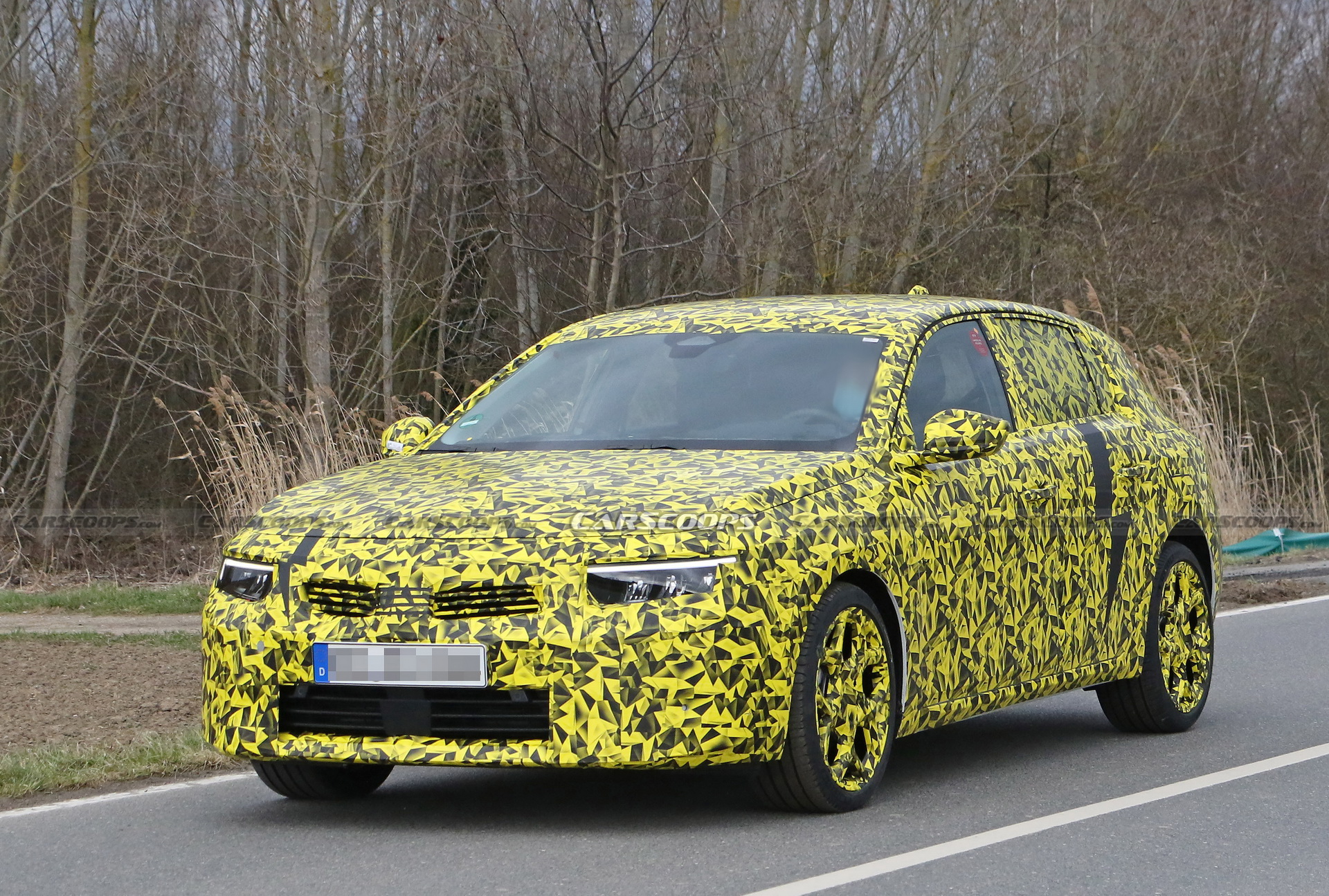 2022 Opel Astra Makes Spy Debut With A Not-So-Subtle Yellow Camo Wrap