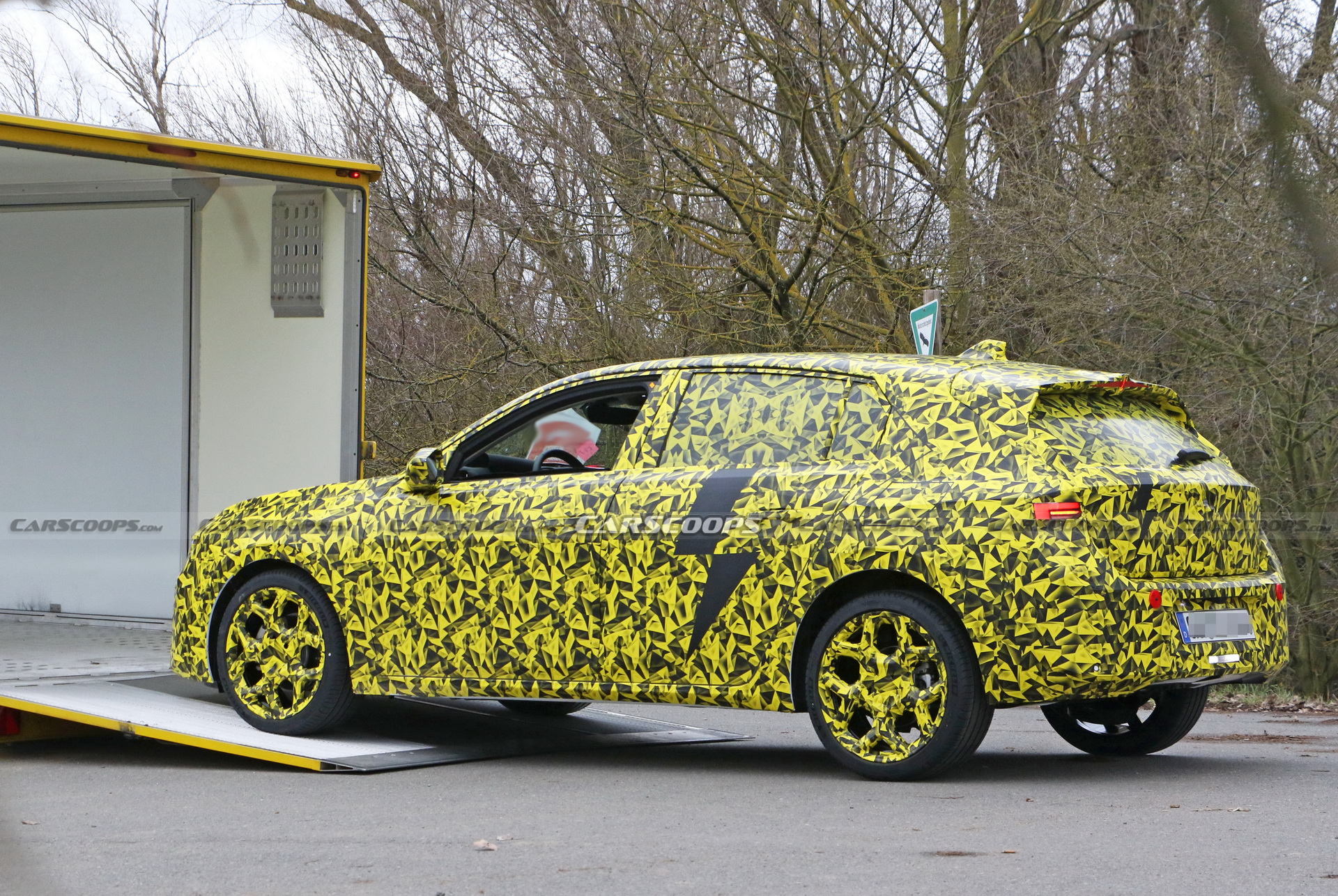 2022 Opel Astra Makes Spy Debut With A Not-So-Subtle Yellow Camo Wrap