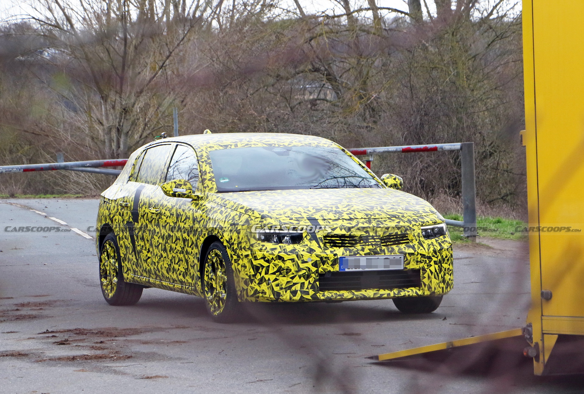2022 Opel Astra Makes Spy Debut With A Not-So-Subtle Yellow Camo Wrap