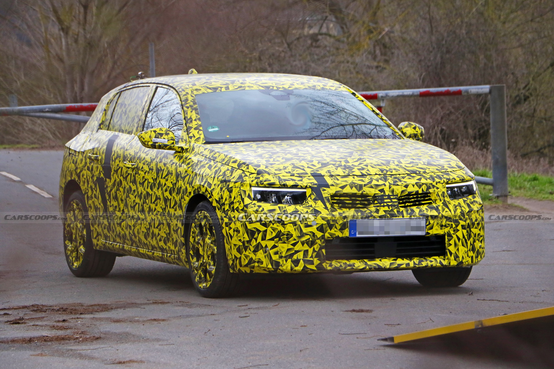 2022 Opel Astra Makes Spy Debut With A Not-So-Subtle Yellow Camo Wrap