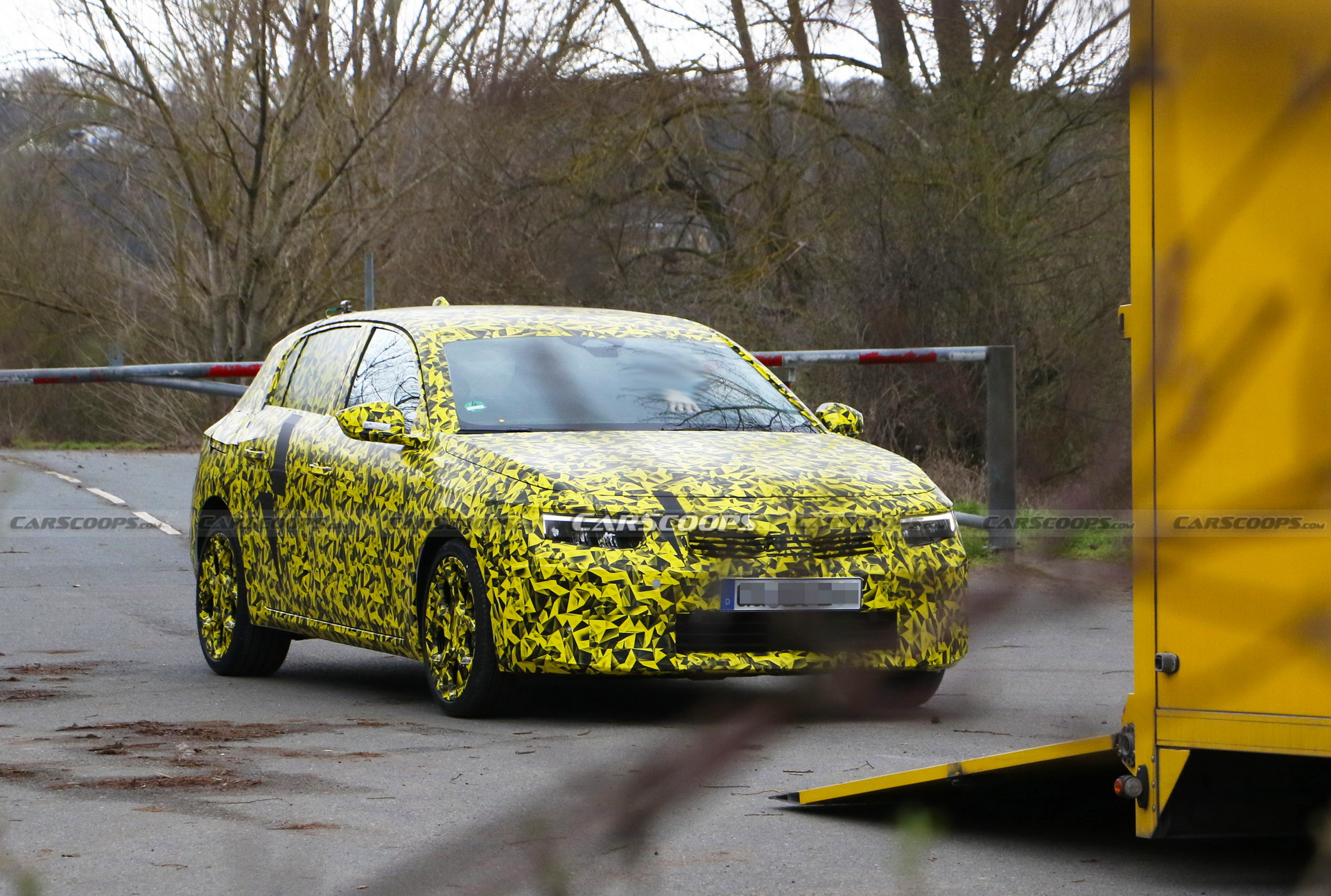 2022 Opel Astra Makes Spy Debut With A Not-So-Subtle Yellow Camo Wrap