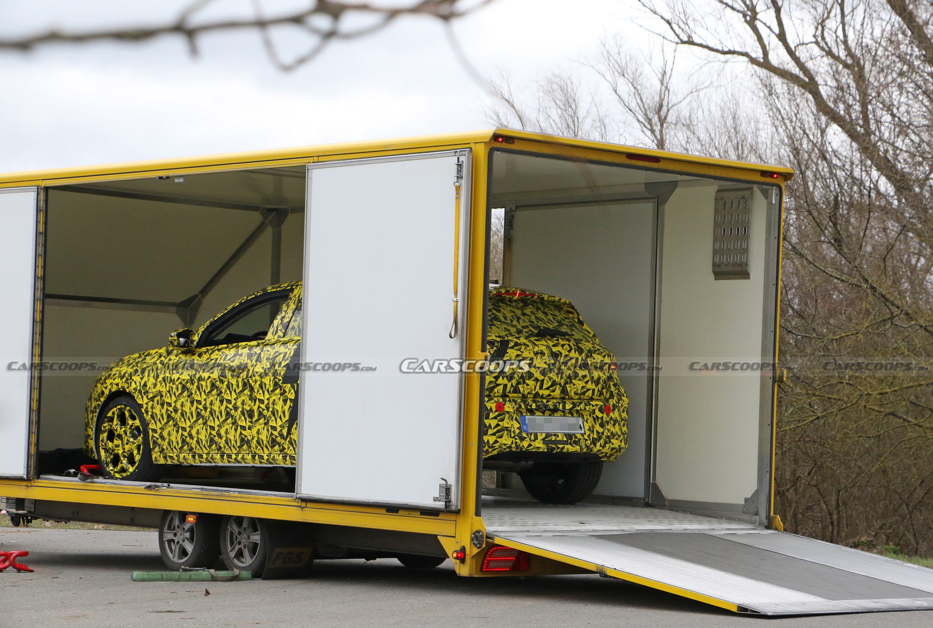 2022 Opel Astra Makes Spy Debut With A Not-So-Subtle Yellow Camo Wrap