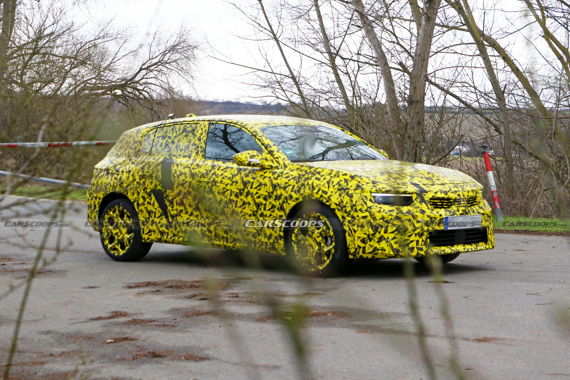 2022 Opel Astra Makes Spy Debut With A Not-So-Subtle Yellow Camo Wrap