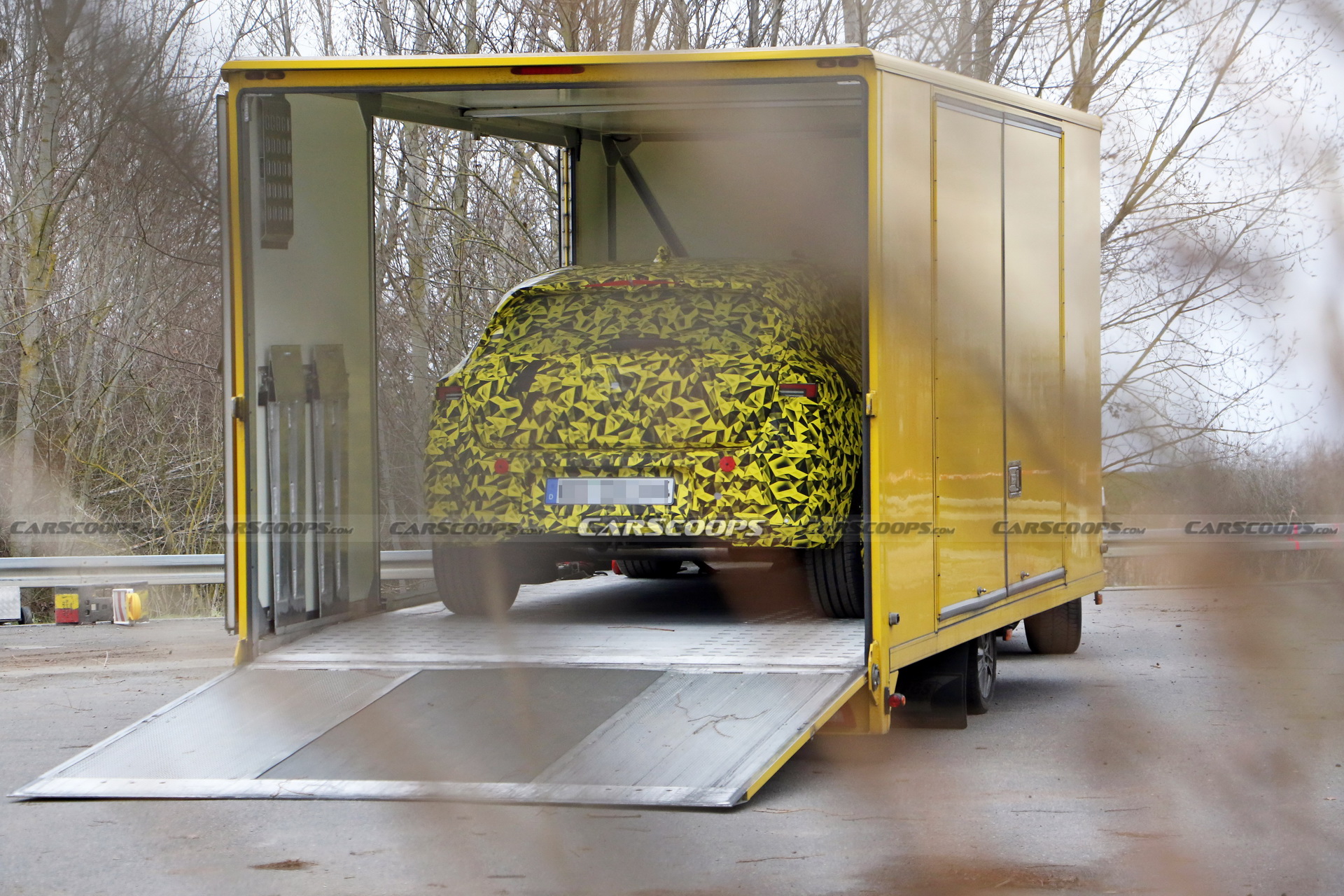 2022 Opel Astra Makes Spy Debut With A Not-So-Subtle Yellow Camo Wrap