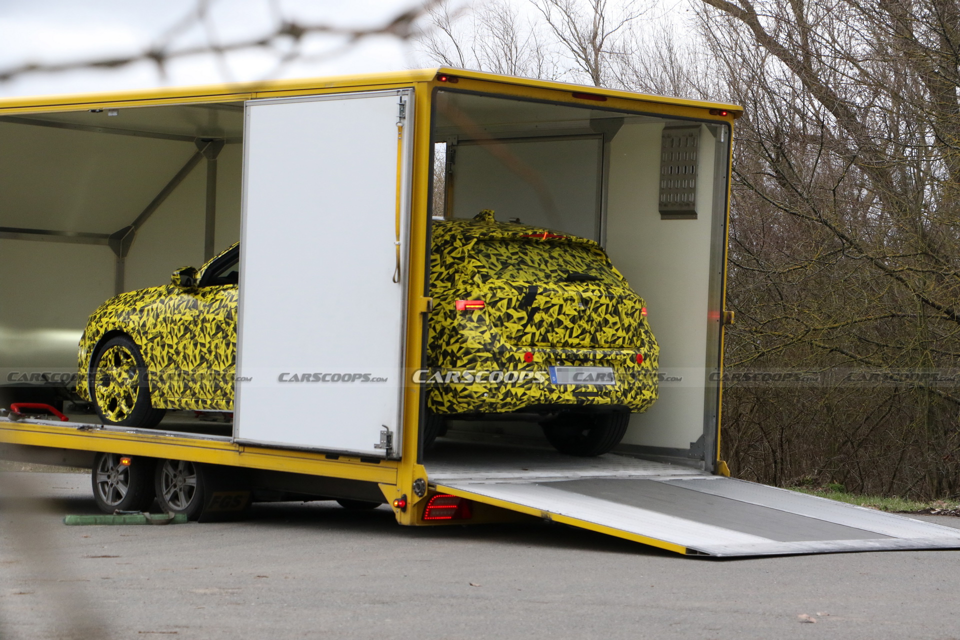 2022 Opel Astra Makes Spy Debut With A Not-So-Subtle Yellow Camo Wrap