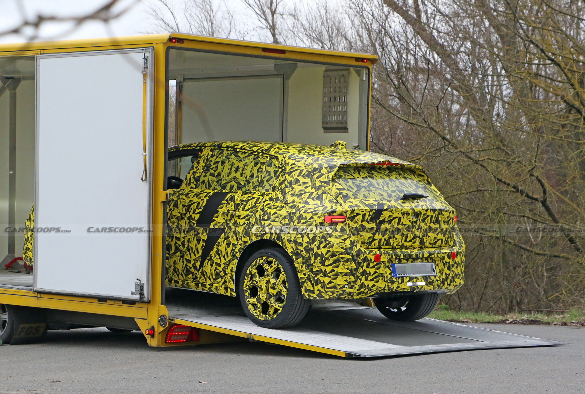 2022 Opel Astra Makes Spy Debut With A Not-So-Subtle Yellow Camo Wrap