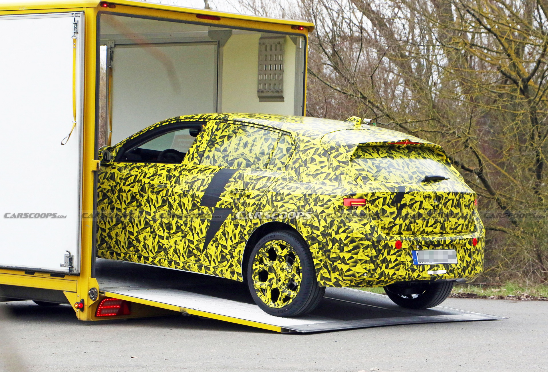 2022 Opel Astra Makes Spy Debut With A Not-So-Subtle Yellow Camo Wrap