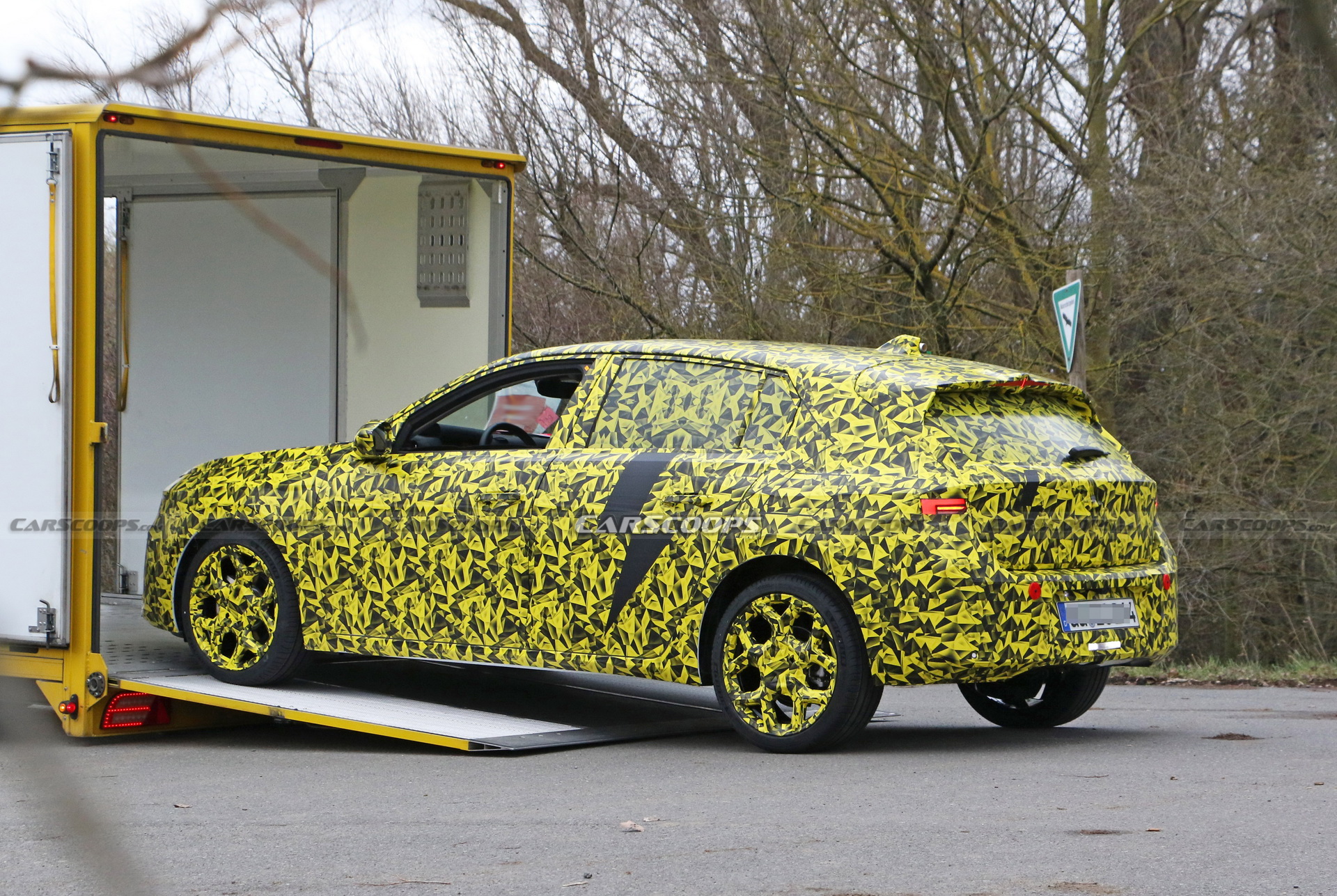 2022 Opel Astra Makes Spy Debut With A Not-So-Subtle Yellow Camo Wrap