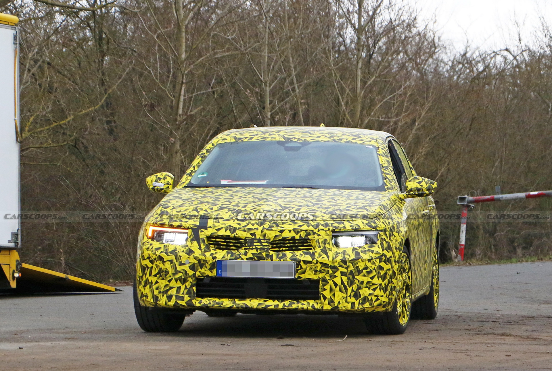 2022 Opel Astra Makes Spy Debut With A Not-So-Subtle Yellow Camo Wrap