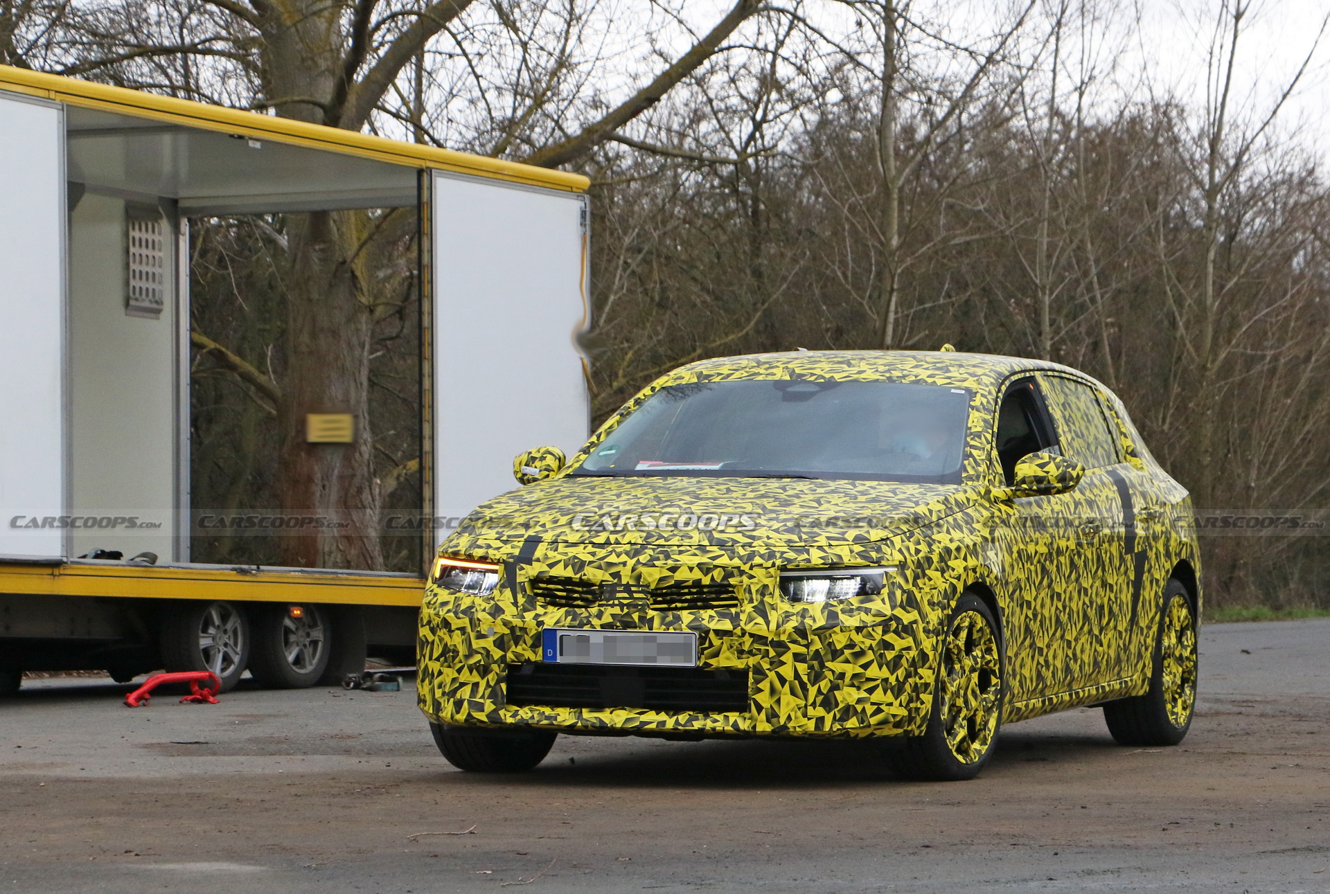 2022 Opel Astra Makes Spy Debut With A Not-So-Subtle Yellow Camo Wrap