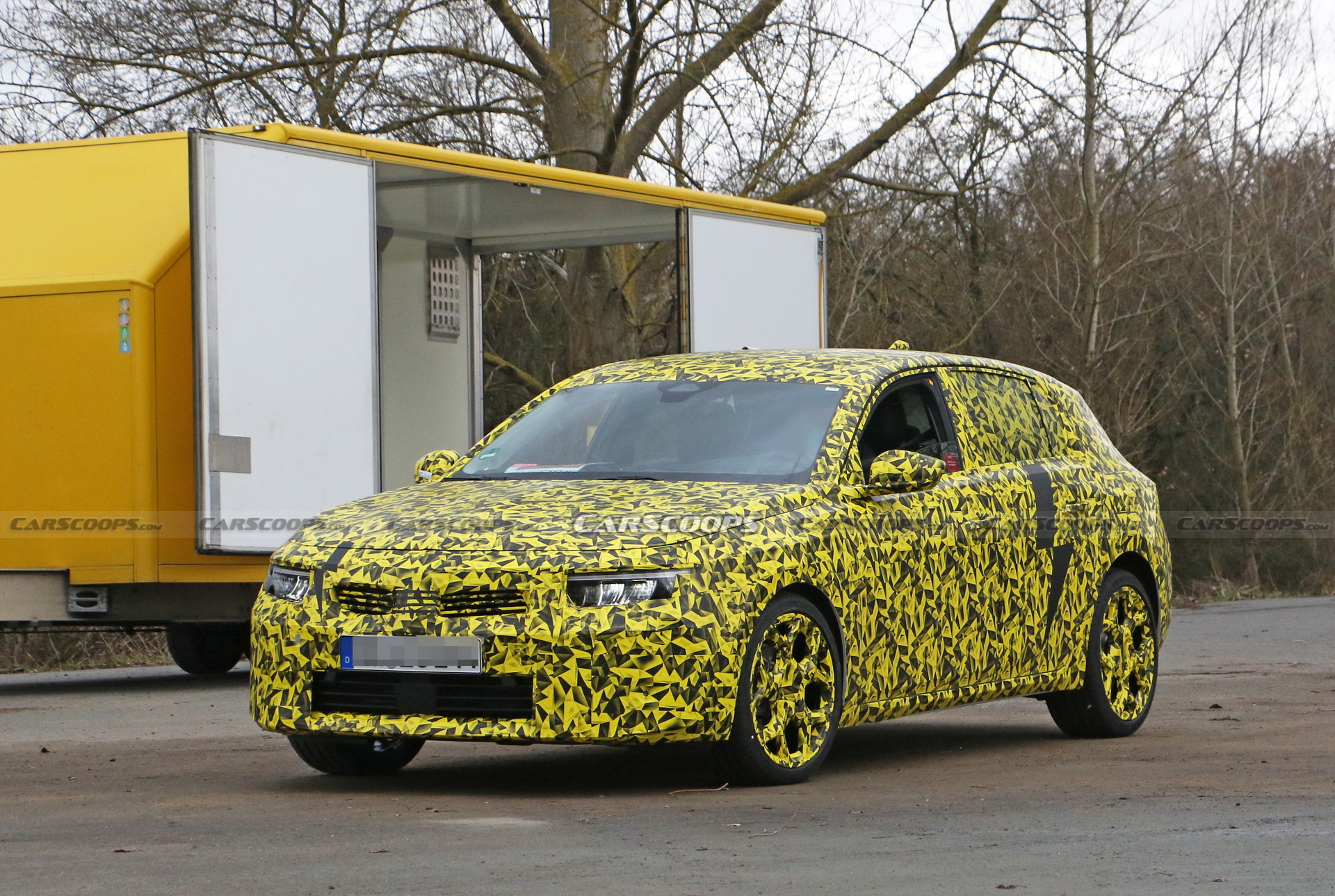 2022 Opel Astra Makes Spy Debut With A Not-So-Subtle Yellow Camo Wrap