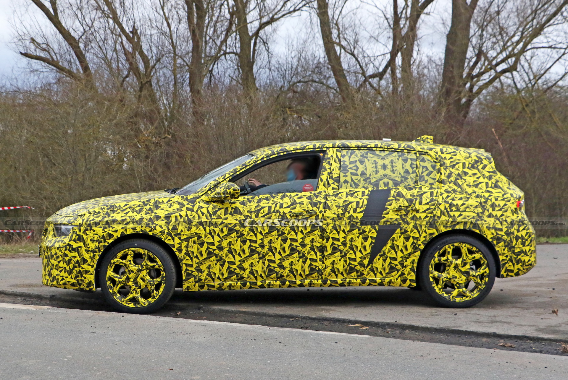 2022 Opel Astra Makes Spy Debut With A Not-So-Subtle Yellow Camo Wrap